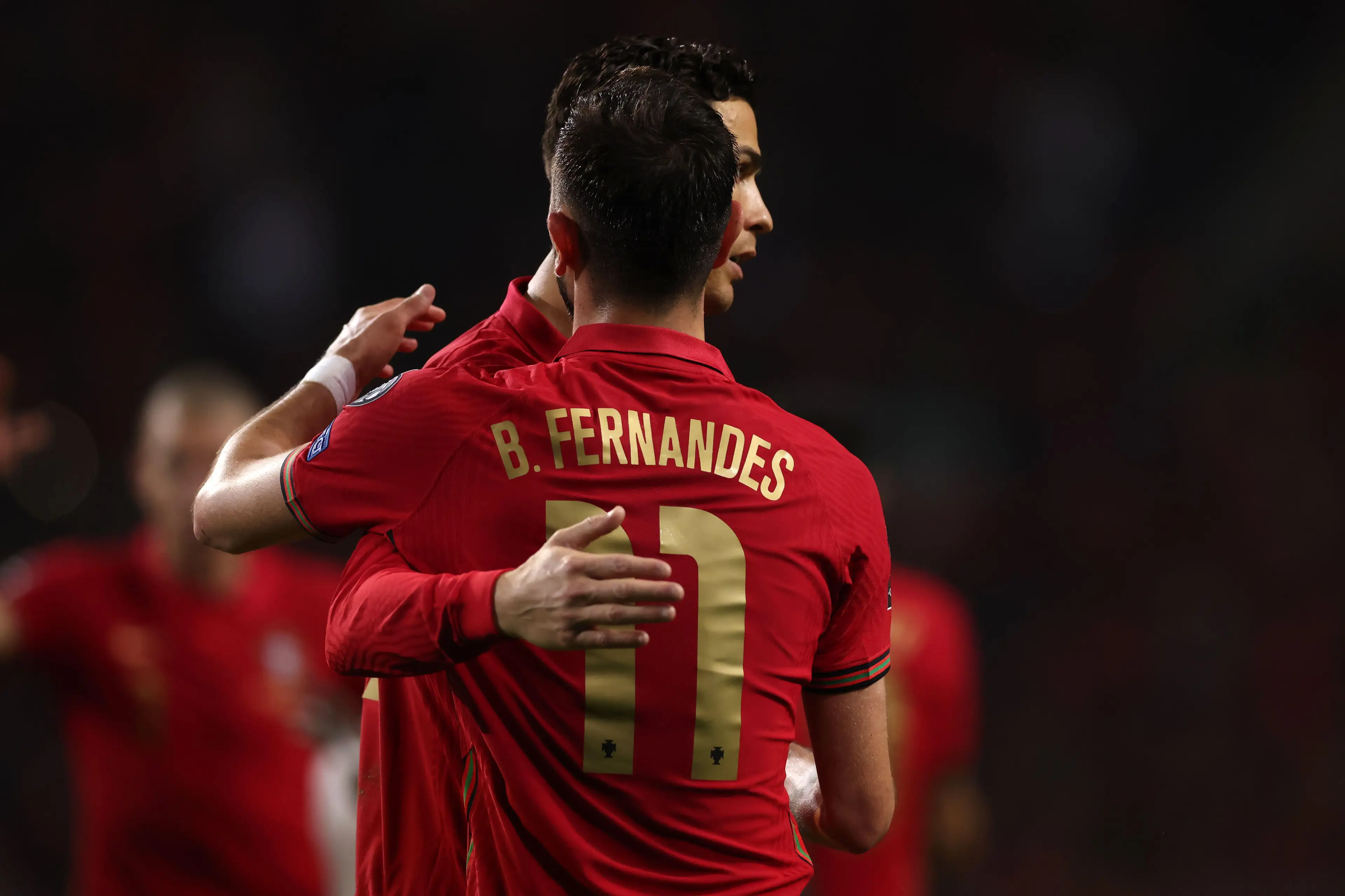 Ronaldo and Fernandes embrace during a World Cup qualifying fixture |