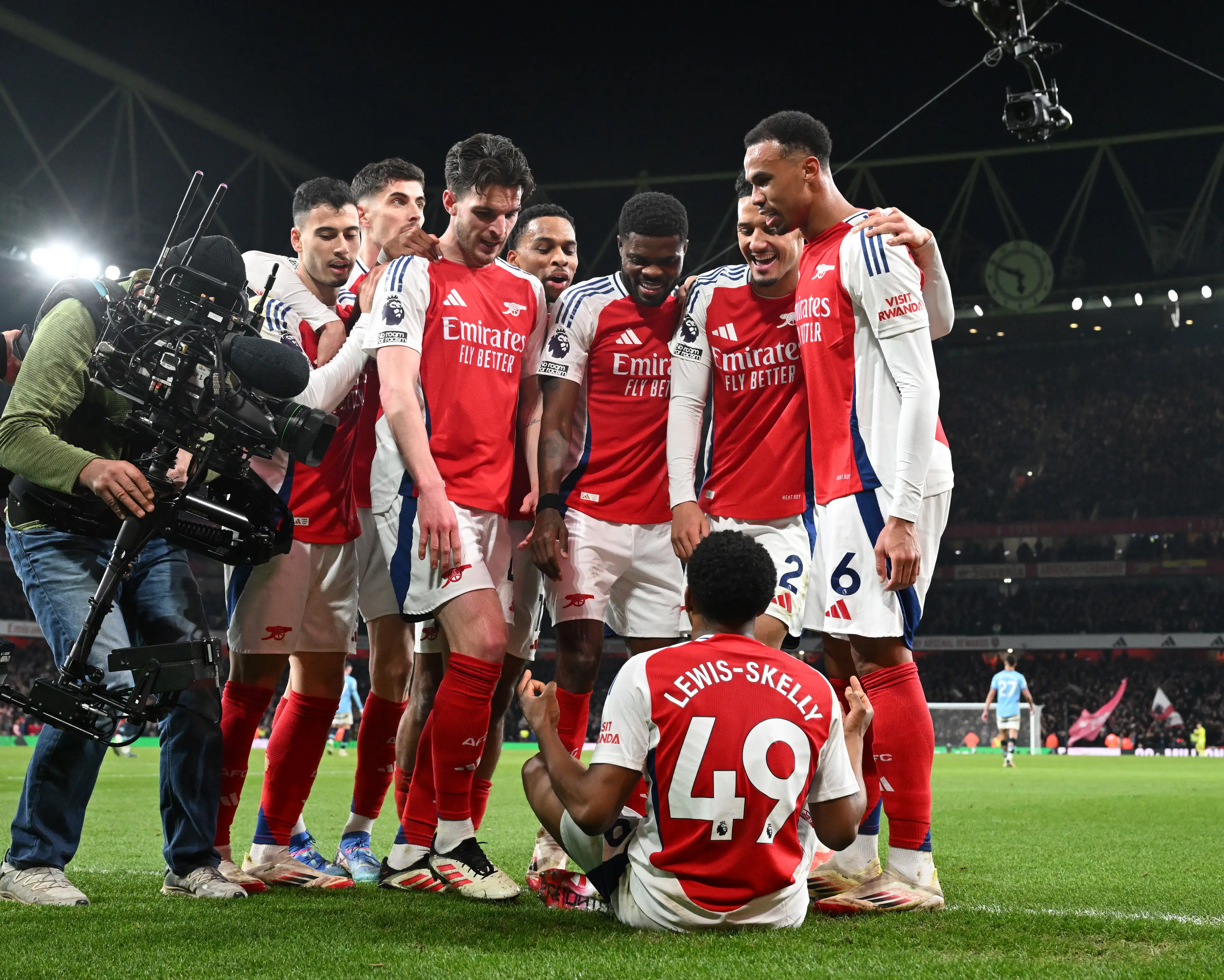 Myles Lewis-Skelly copies Erling Haaland's celebration after his goal against Manchester City. Image: Getty 