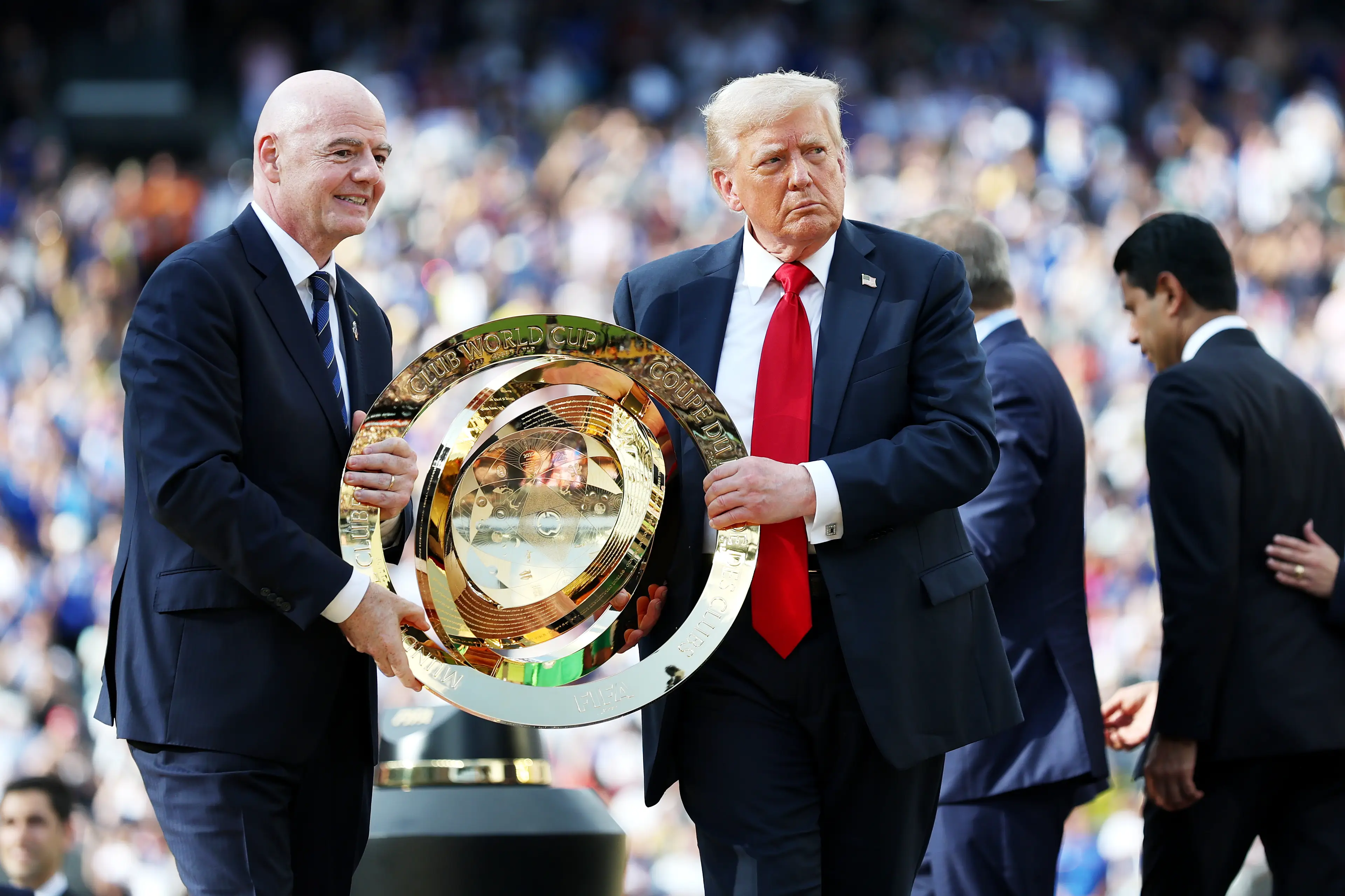  Gianni Infantino and Donald Trump with the Club World Cup trophy (credit: getty)