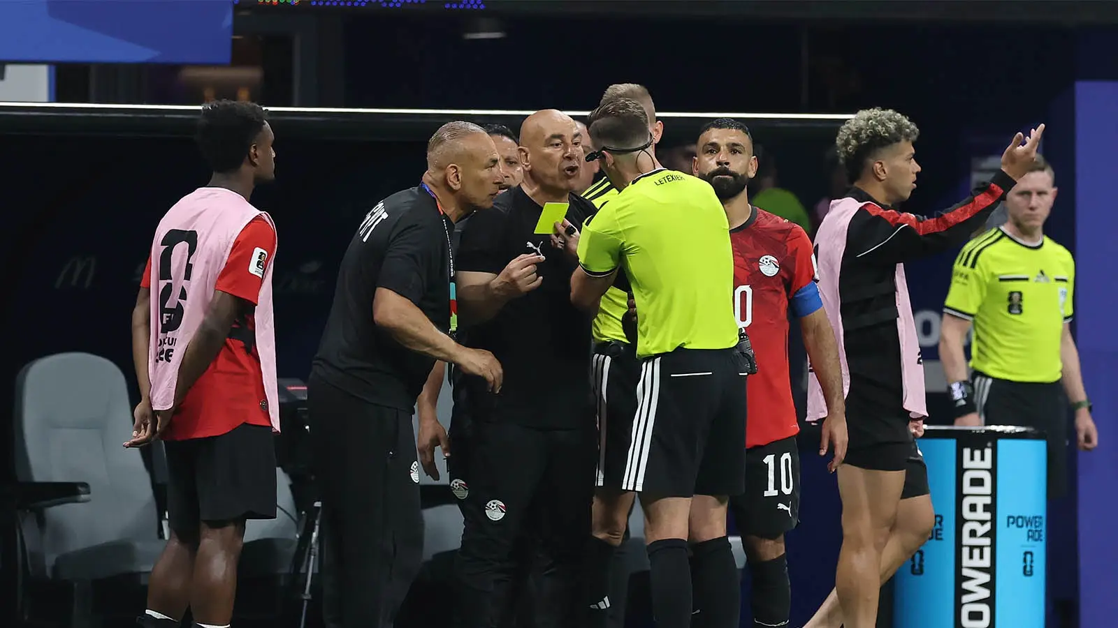 Egypt manager Hossam Hassan was booked at the end of his side's defeat to Argentina (Image: Getty)