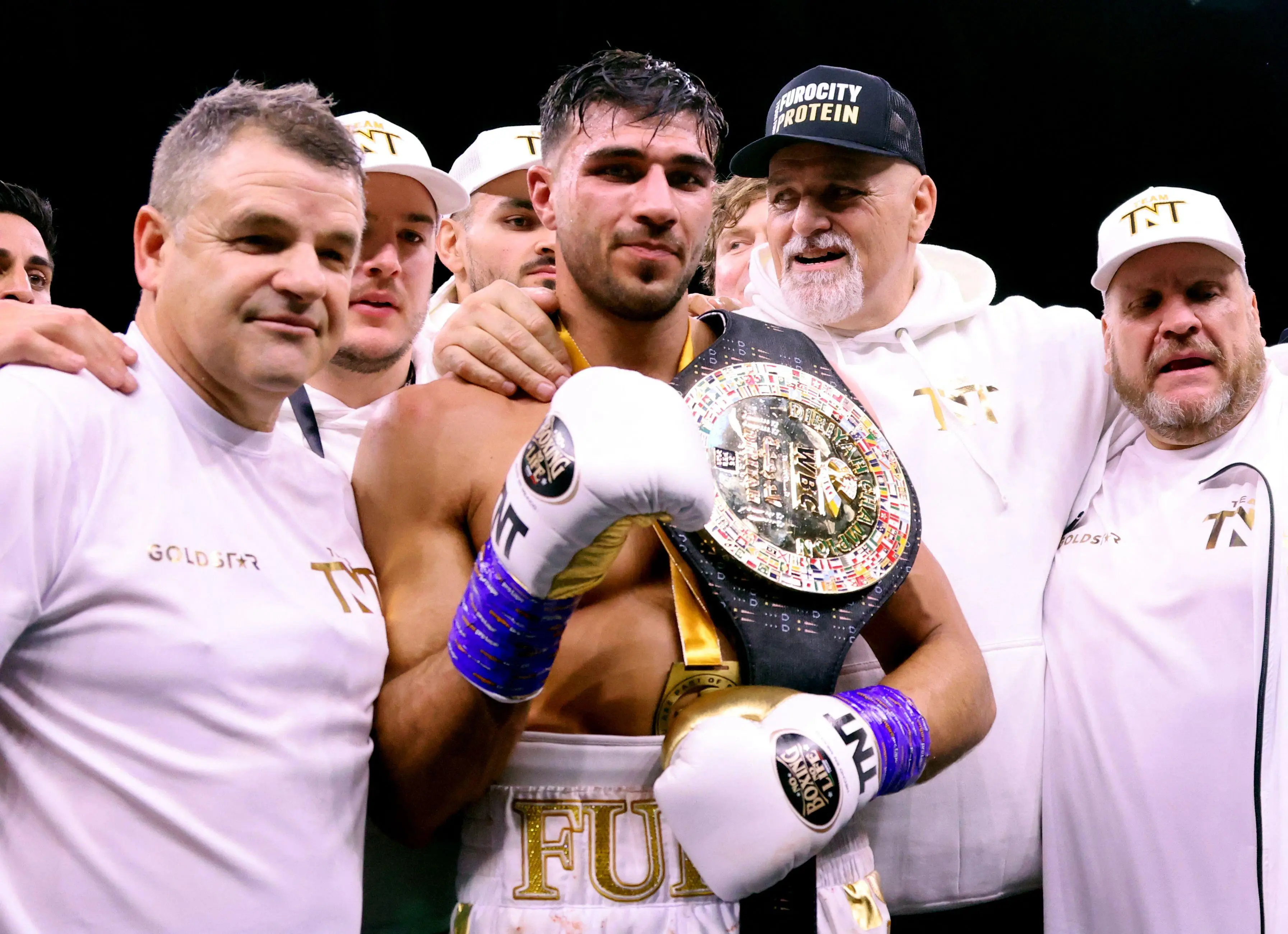 Tommy Fury celebrates his win over Jake Paul. Image: Alamy