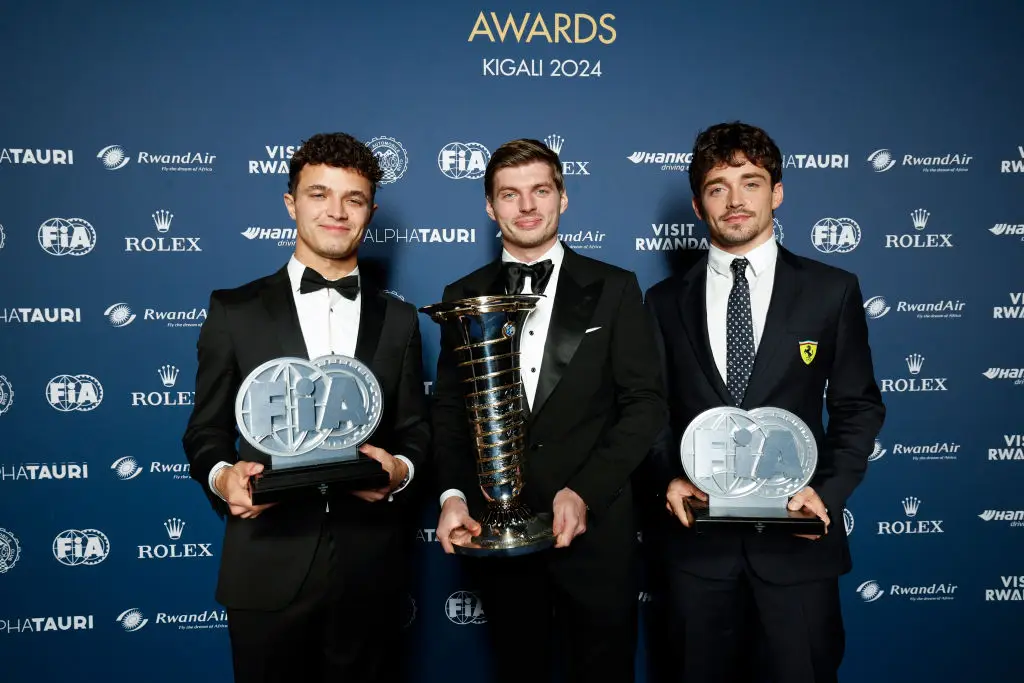 Lando Norris, Max Verstappen and Charles Leclerc pictured at the 2024 FIA Prizegiving Ceremony (Image: Getty)