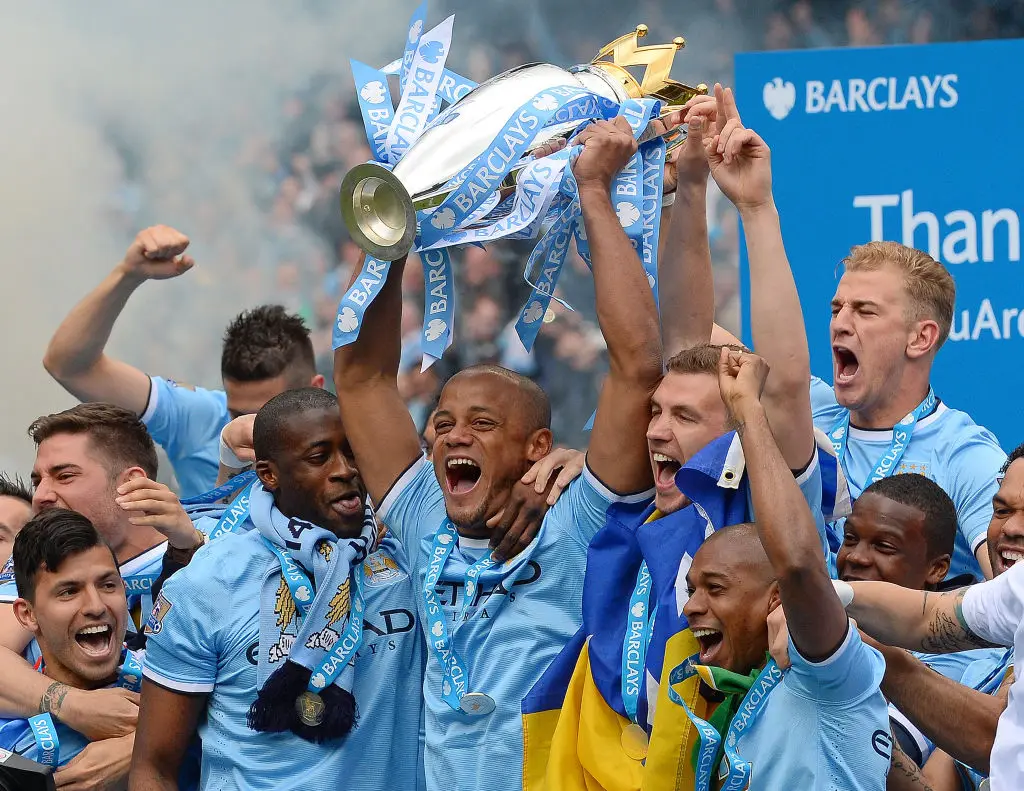 Man City players celebrate winning the Premier League in 2014 (Image: Getty)
