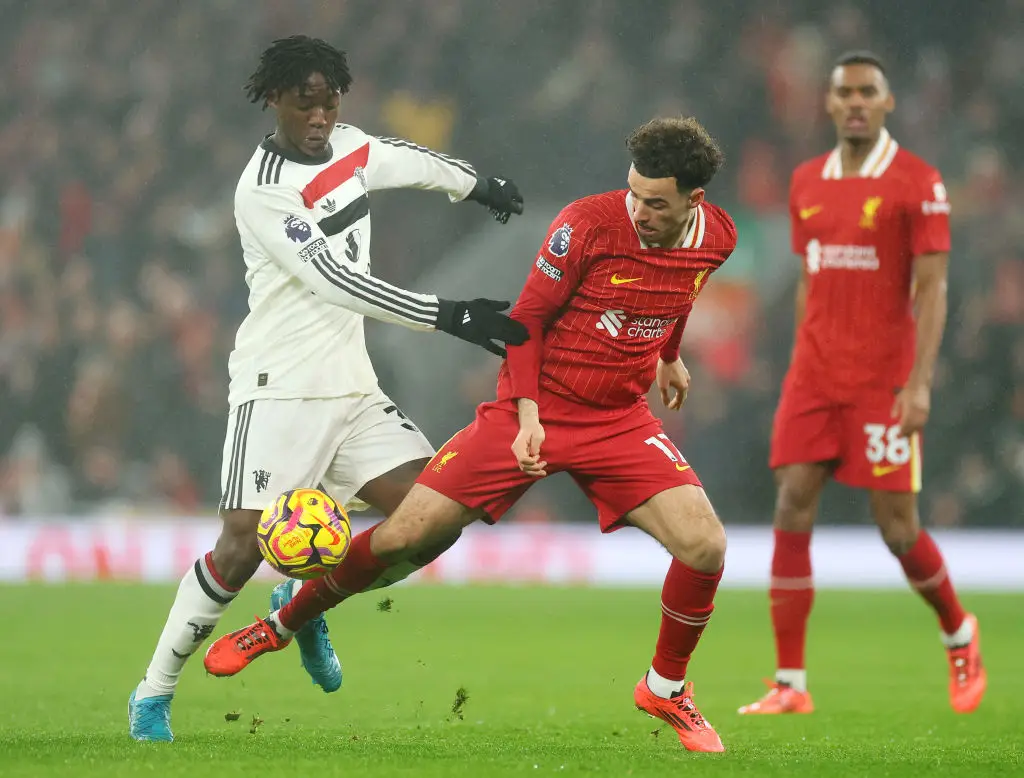 Kobbie Mainoo battles for the ball with Curtis Jones during Man Utd's 2-2 draw at Liverpool on Sunday (Image: Getty)