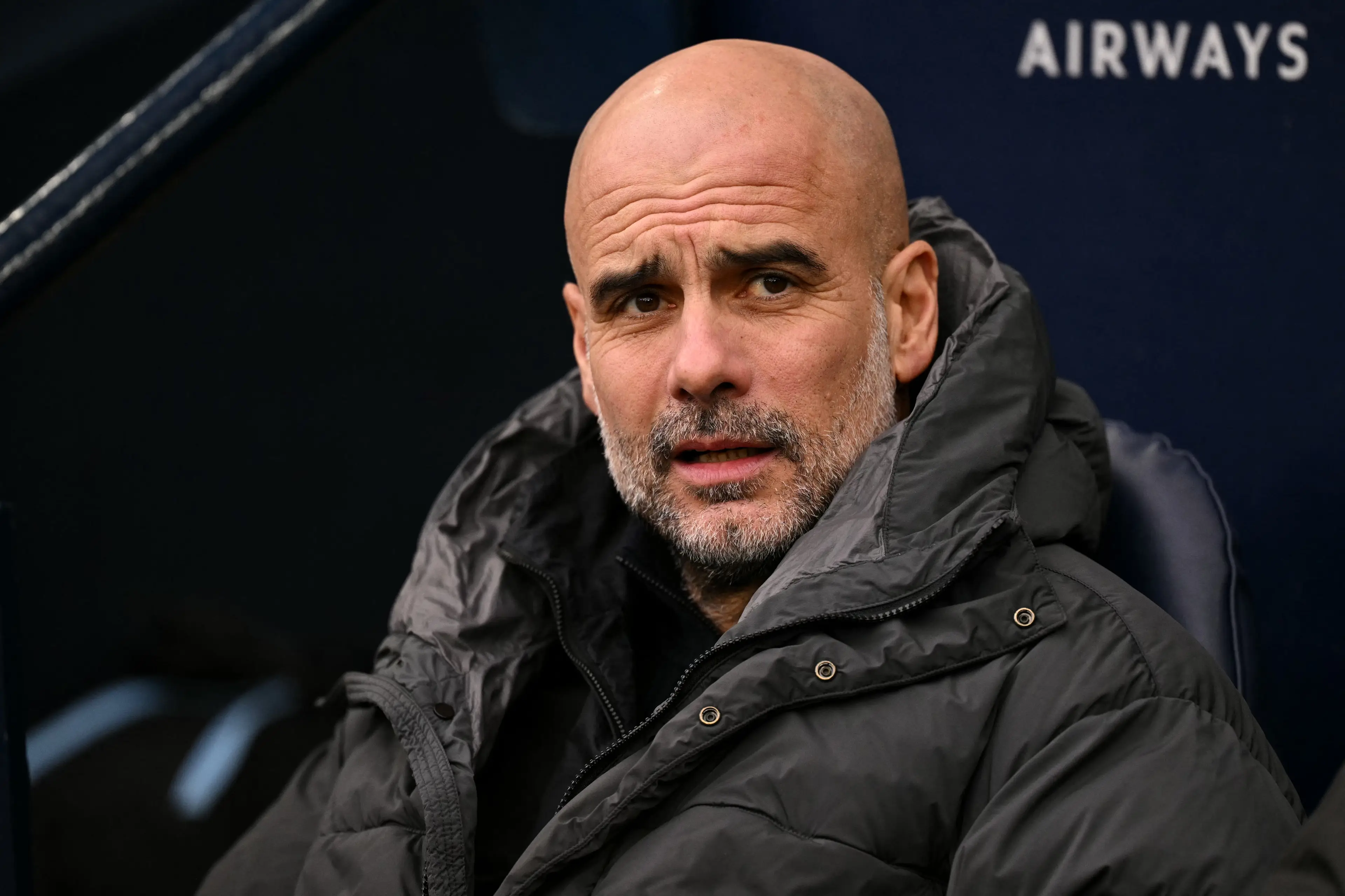 Pep Guardiola and Man City are still awaiting their 115 charges verdict (Image: Getty)
