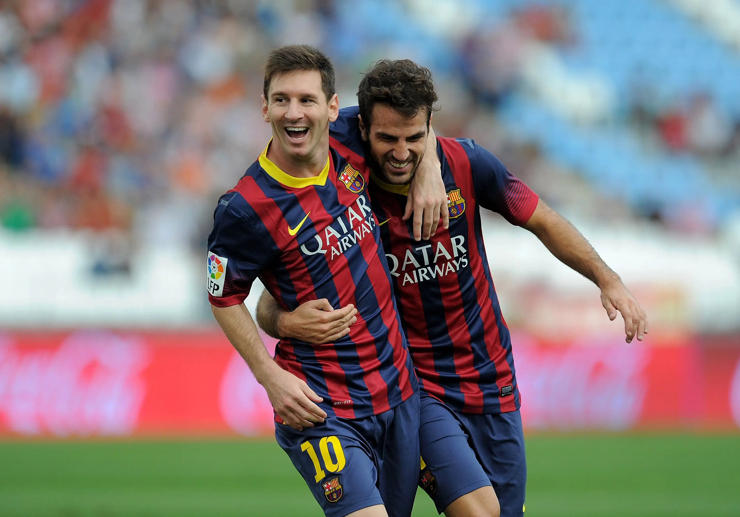 Lionel Messi and Cesc Fabregas. (