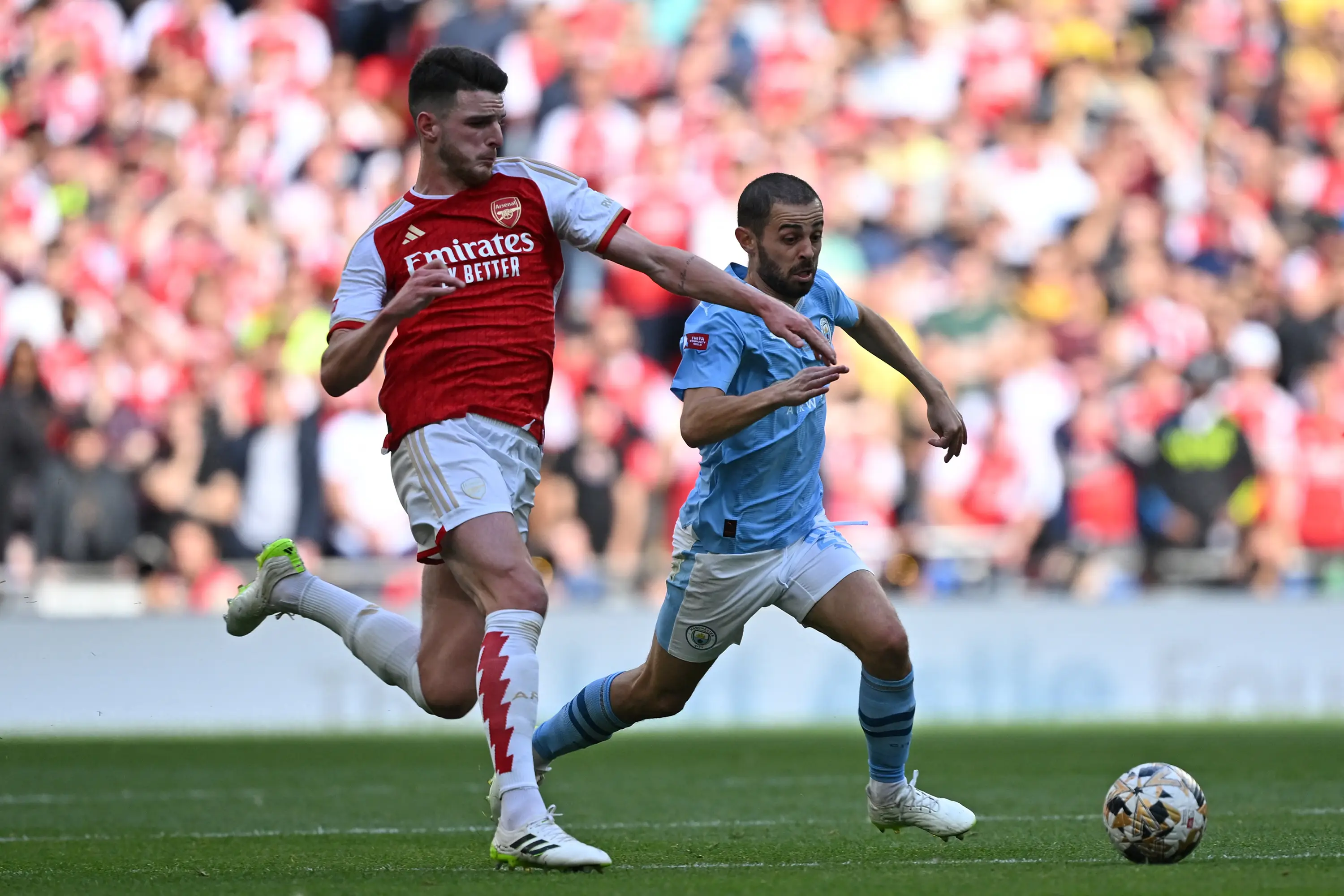 Bernardo Silva and Declan during a match between Arsenal and Manchester City. Image: Getty