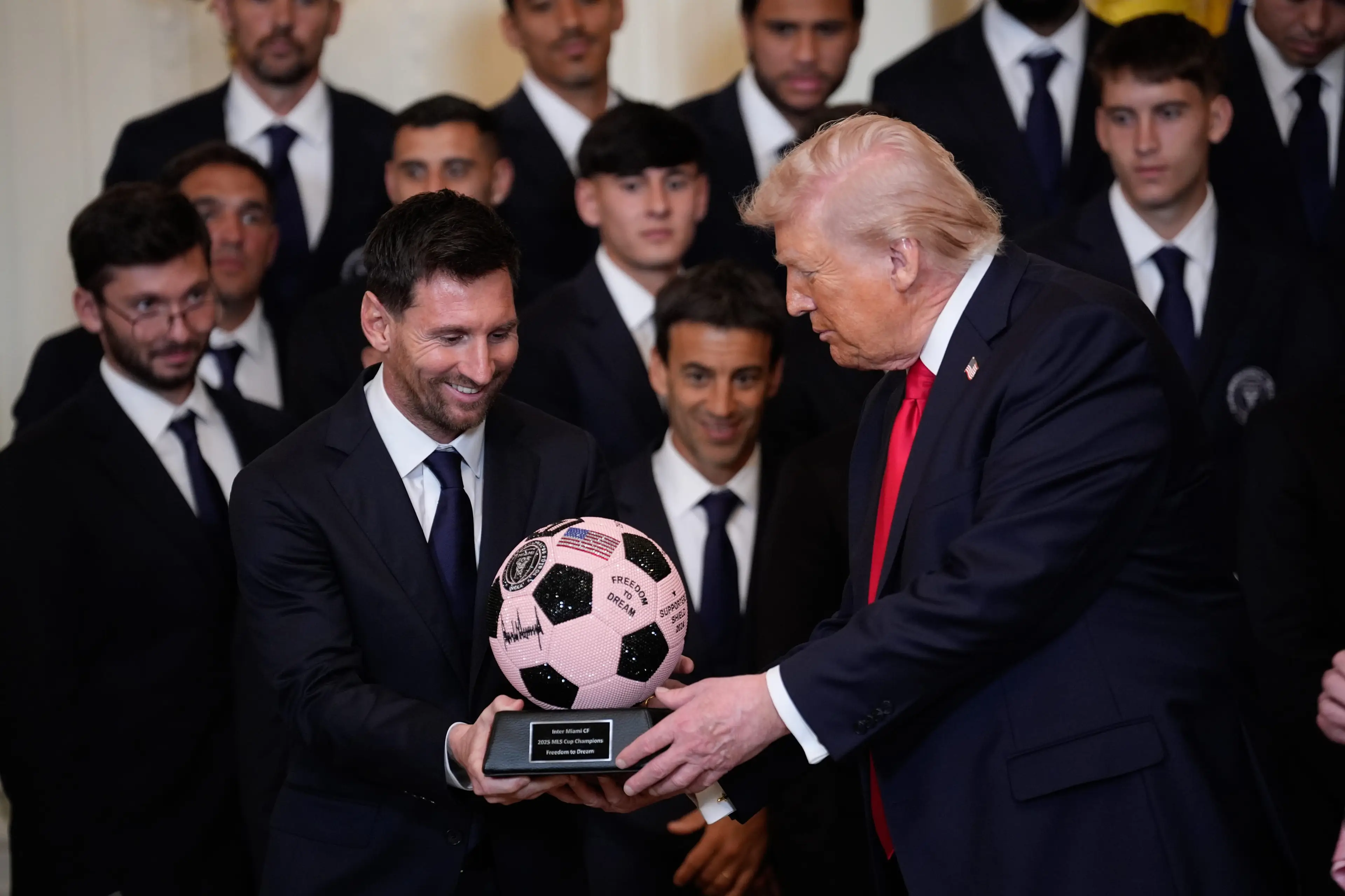 Messi was handed a signed football by Trump (Image: Getty)