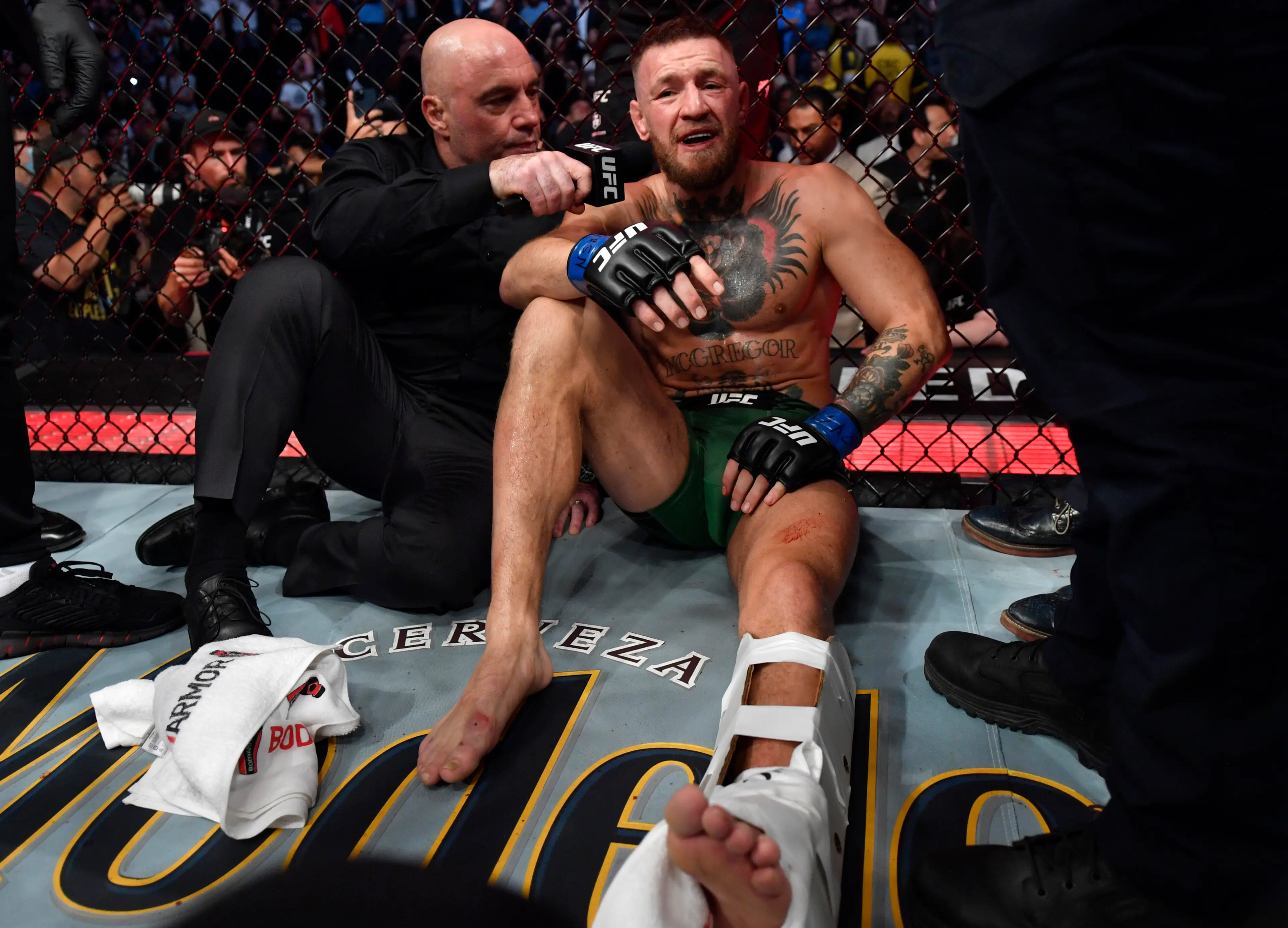 Joe Rogan interviews Conor McGregor following his defeat to Dustin Poirier at UFC 264. Image: Getty 