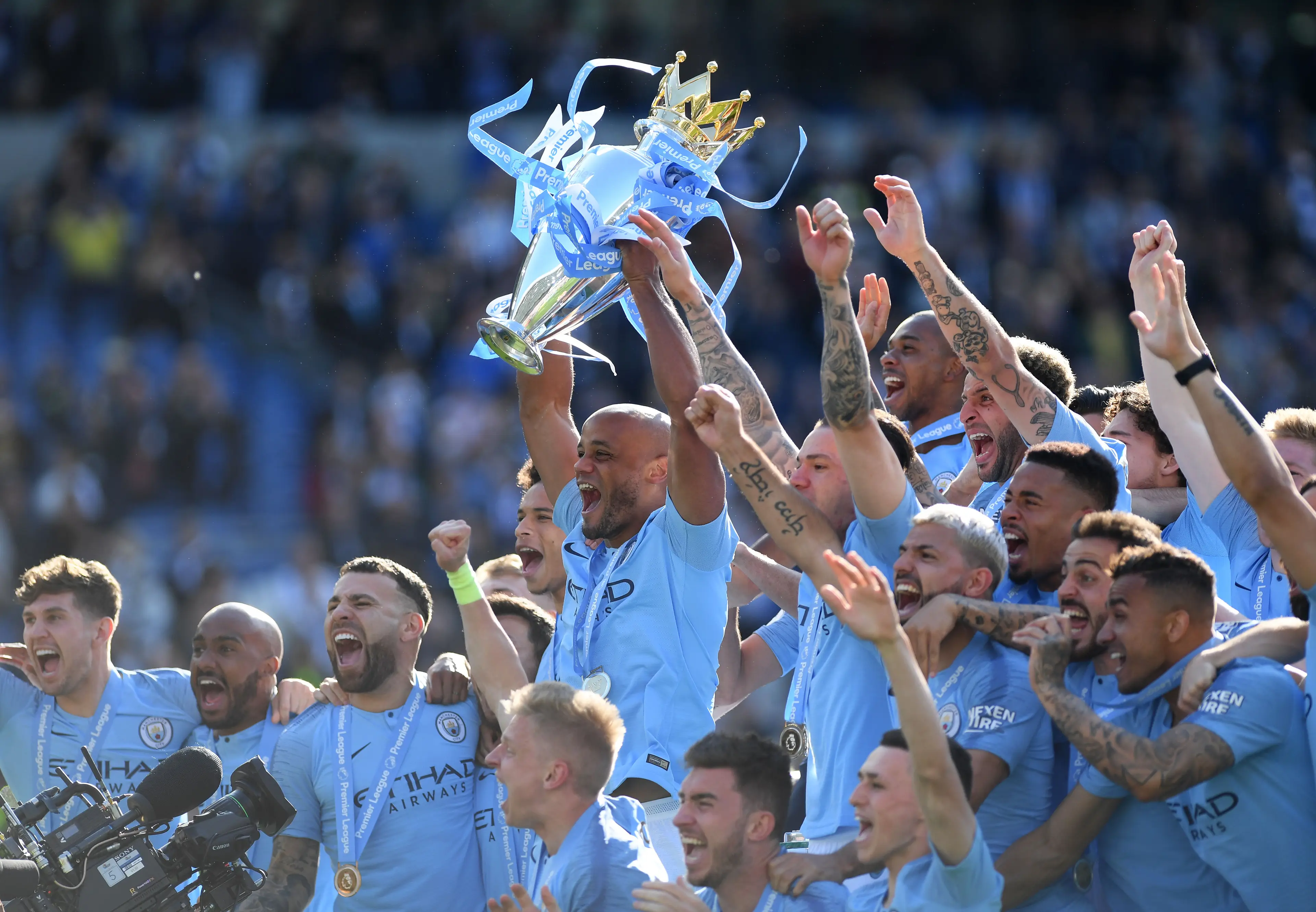 Manchester City captain Vincent Kompany lifts the Premier League trophy. Image credit: Getty