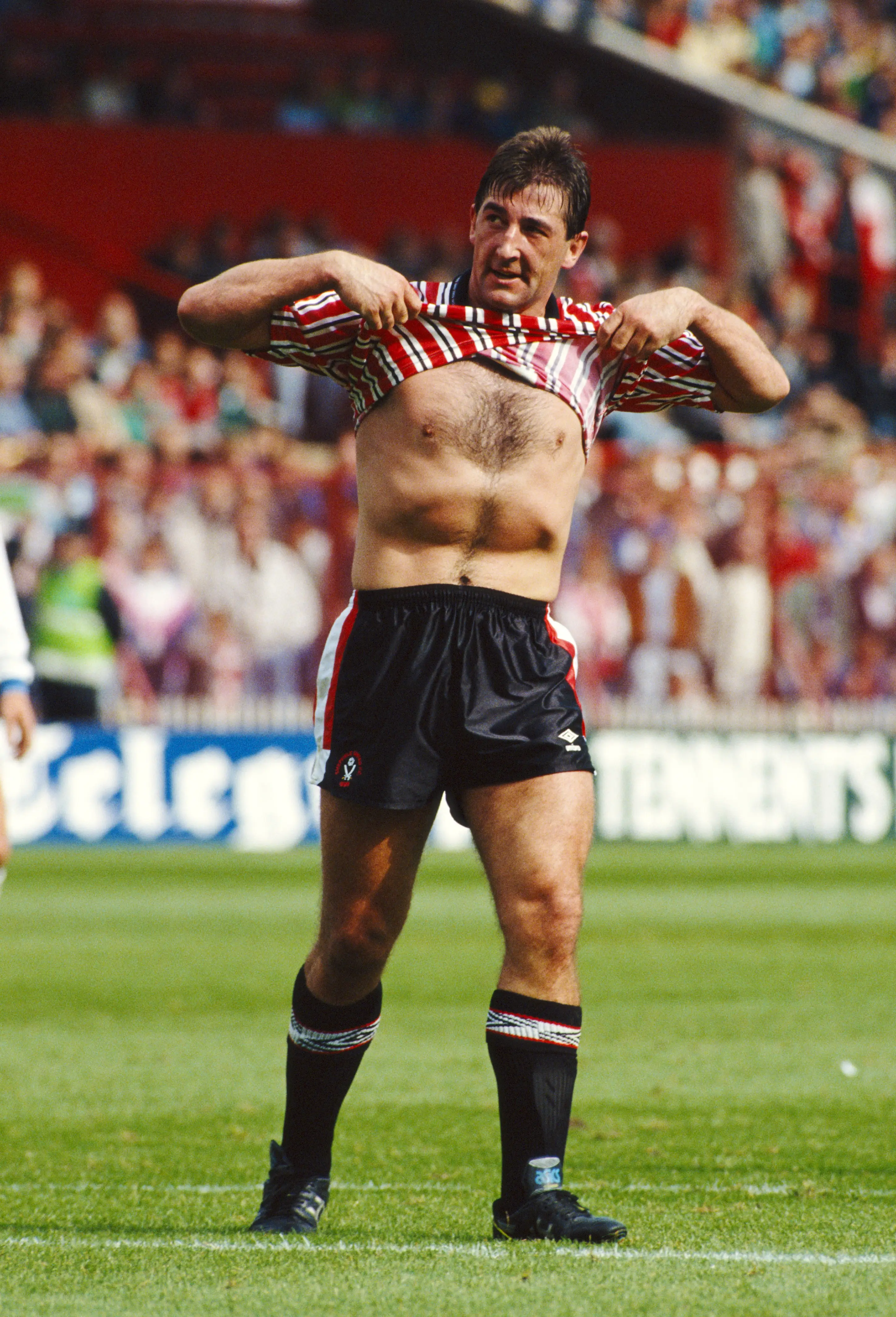 Billy Whitehurst lifts his shirt to supporters during a clash between Sheffield United and Leeds United. Image credit: Getty