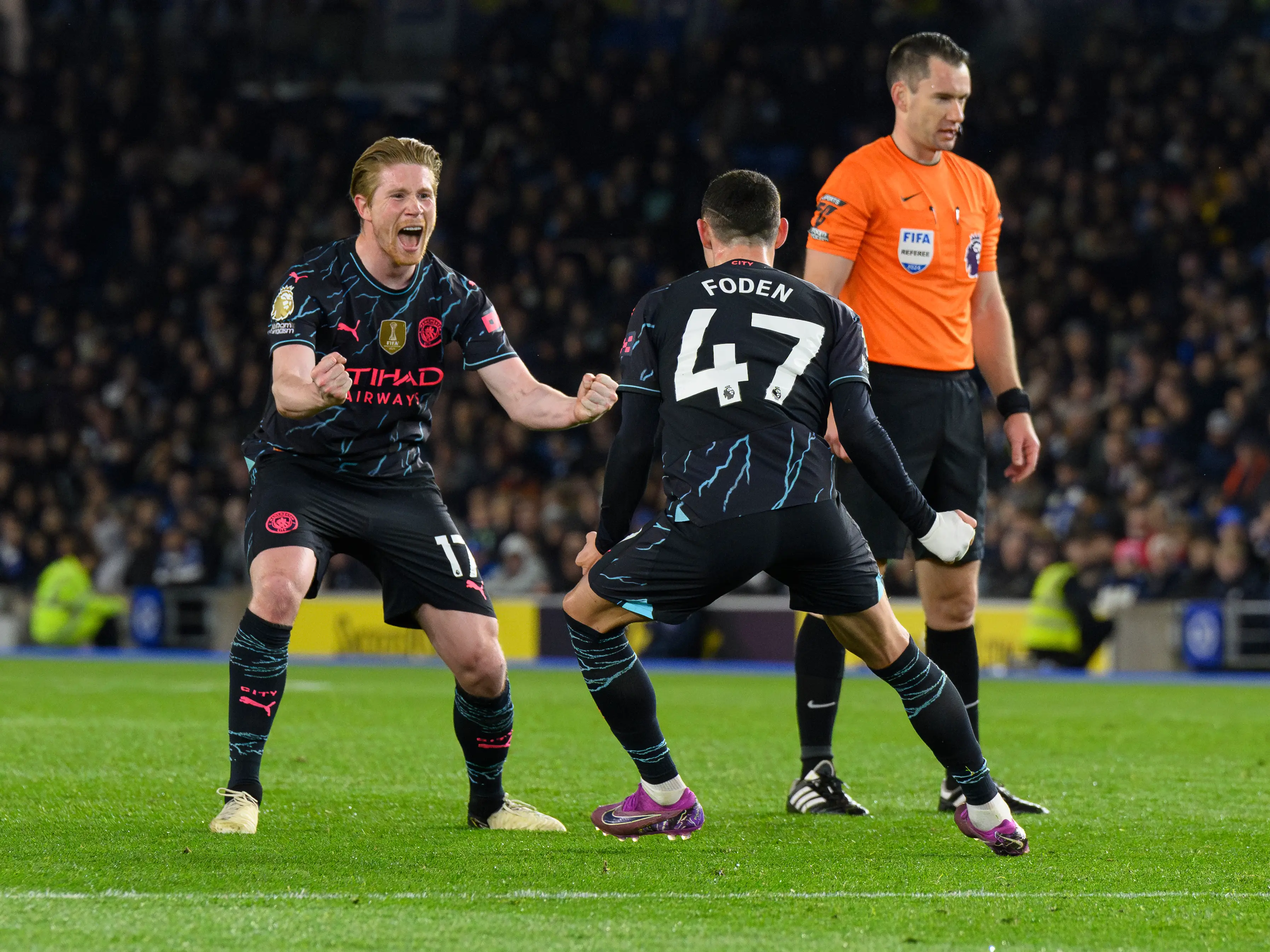 Kevin De Bruyne and Phil Foden celebrate against Brighton. Image: Getty 