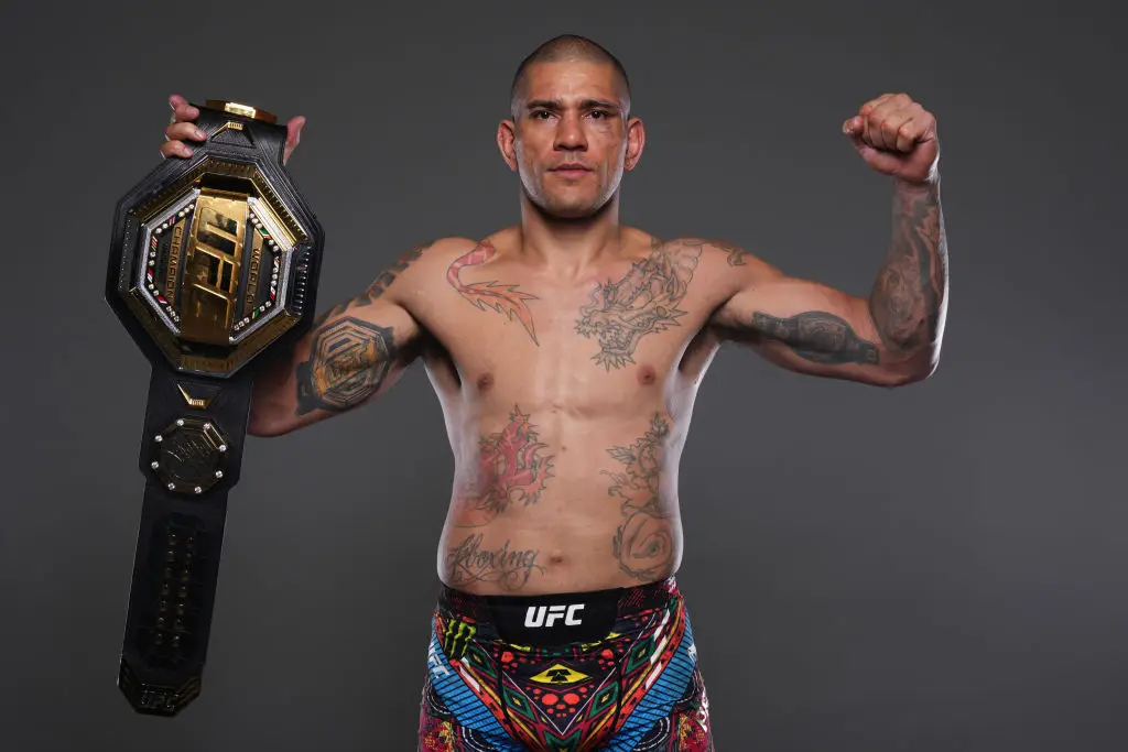 Alex Pereira celebrates after retaining the UFC Light Heavyweight Championship - Getty