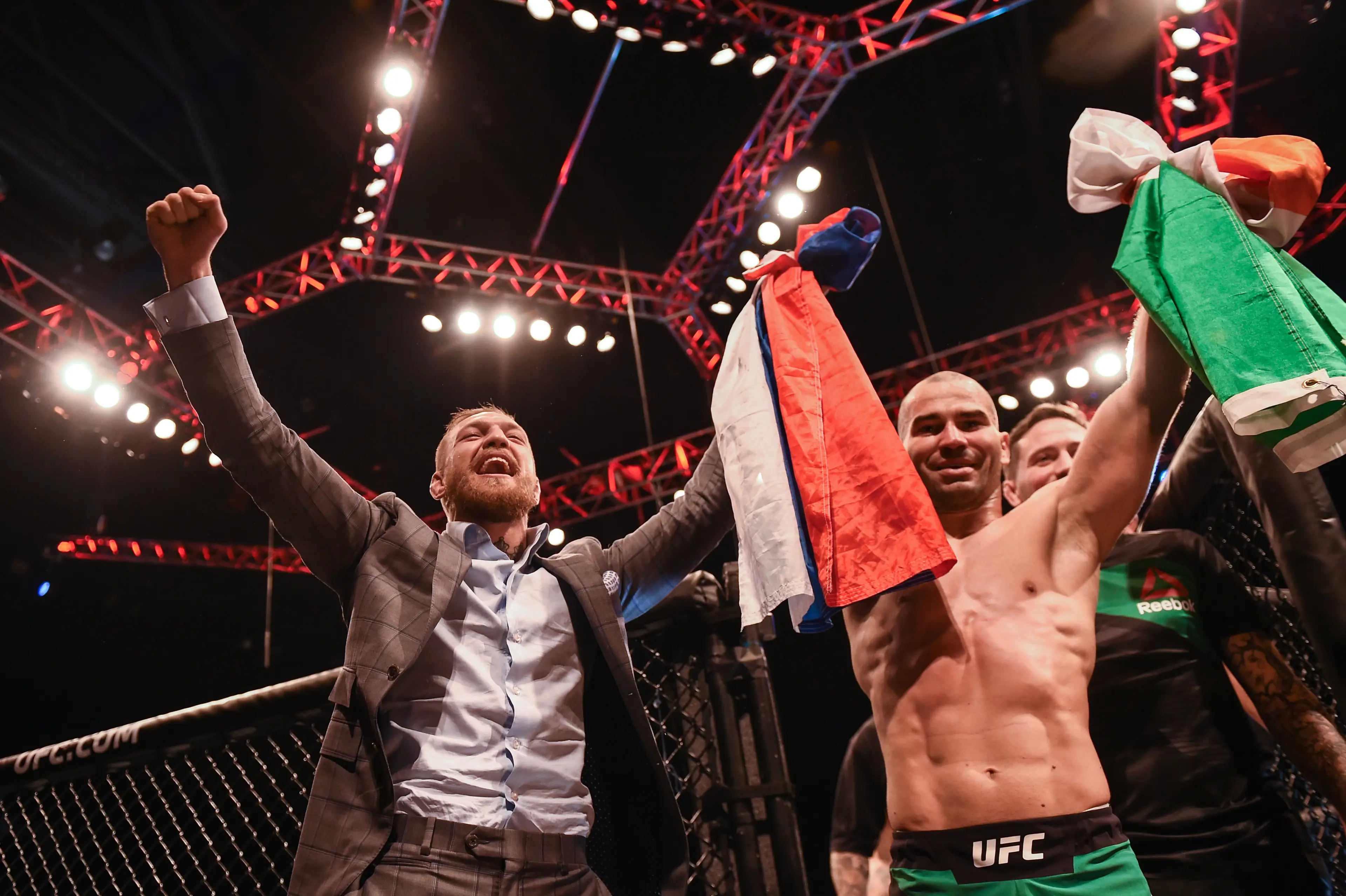 Artem Lobov celebrates his UFC victory in Belfast with Conor McGregor. Image: Getty 