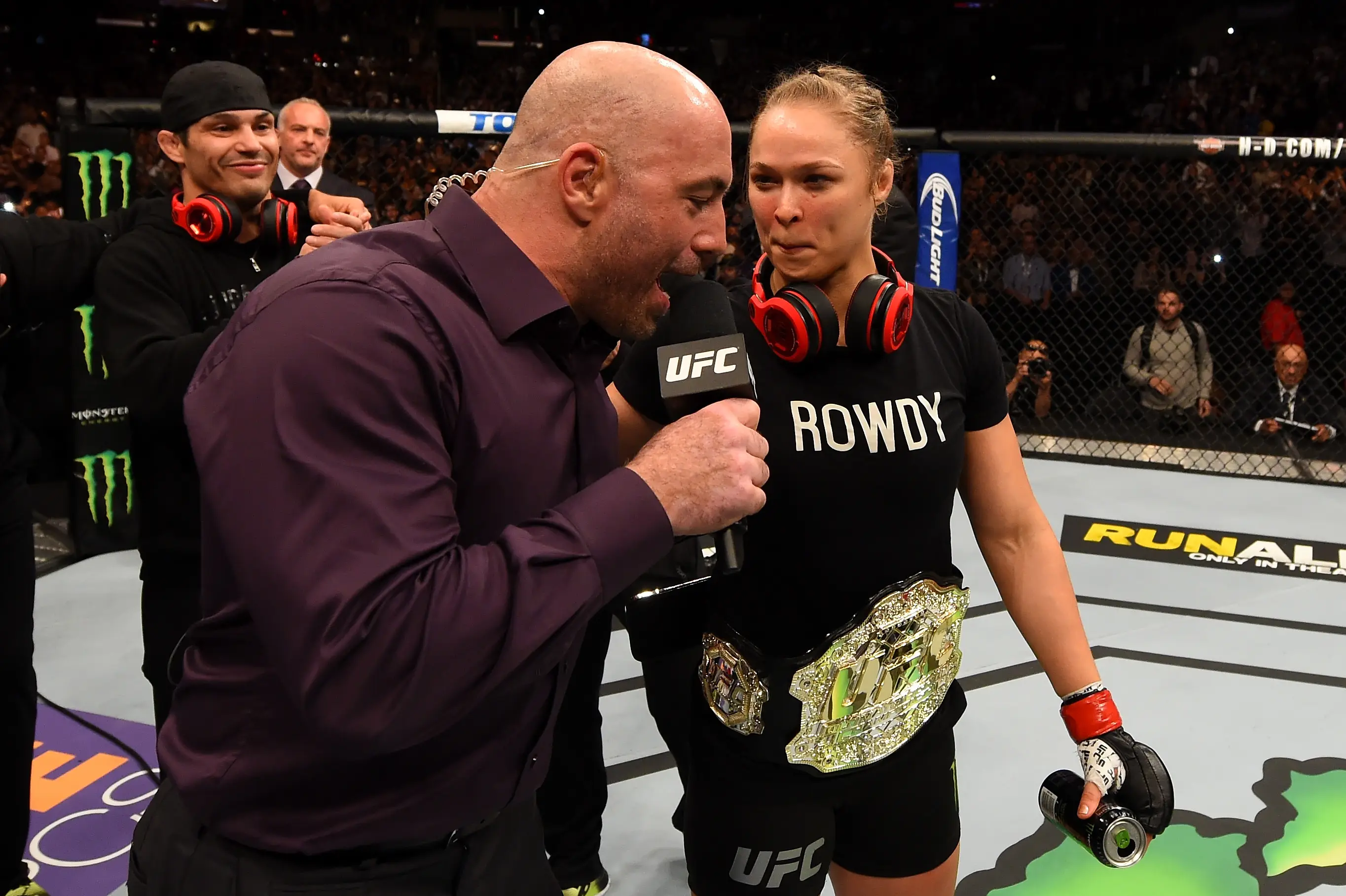 Joe Rogan interviews Ronda Rousey after her UFC title fight. Image: Getty 