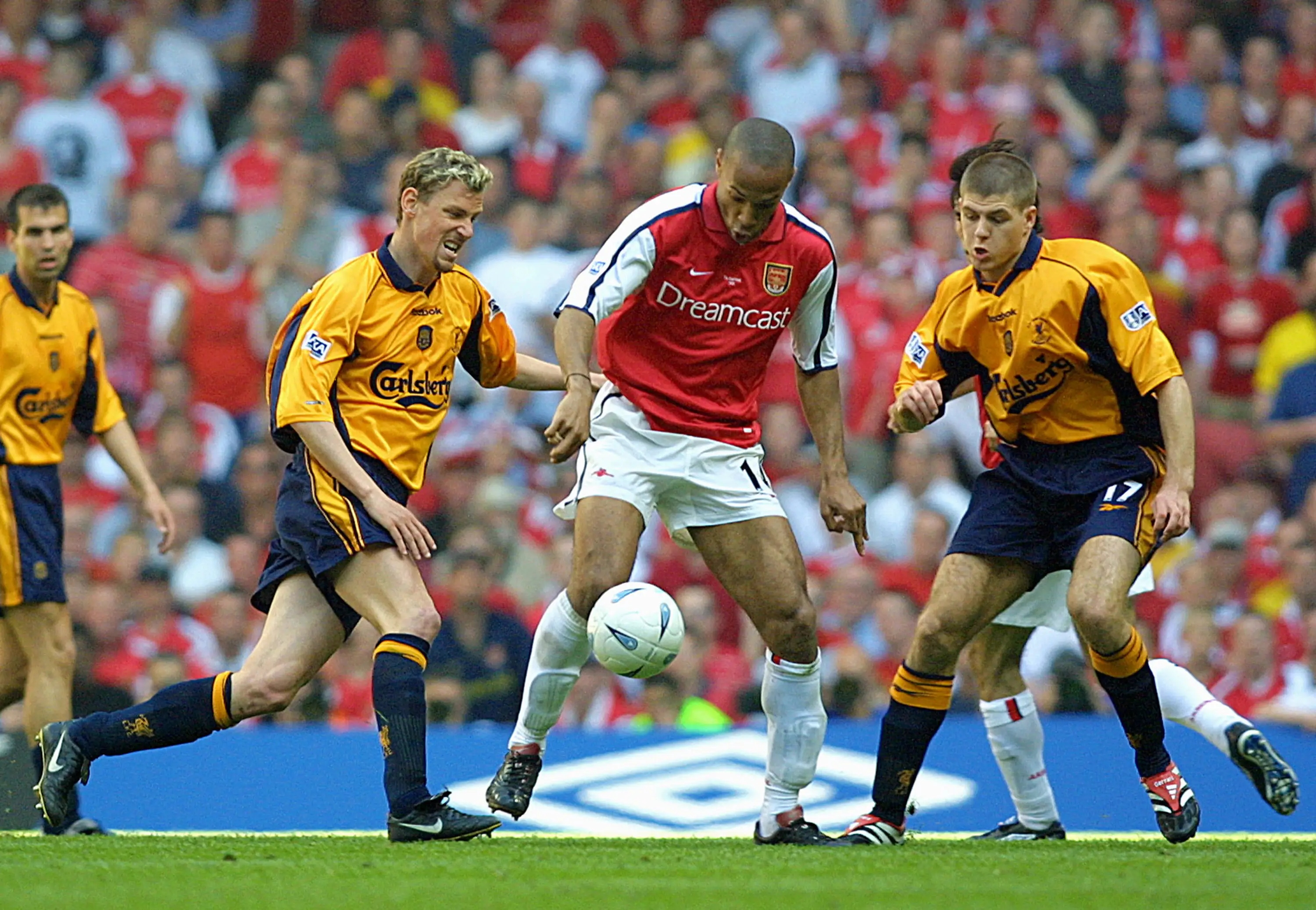 Stephan Henchoz of Liverpool, Thierry Henry of Arsenal and Garrard of Liverpool challenge during the Axa FA Cup Final (Getty Images)
