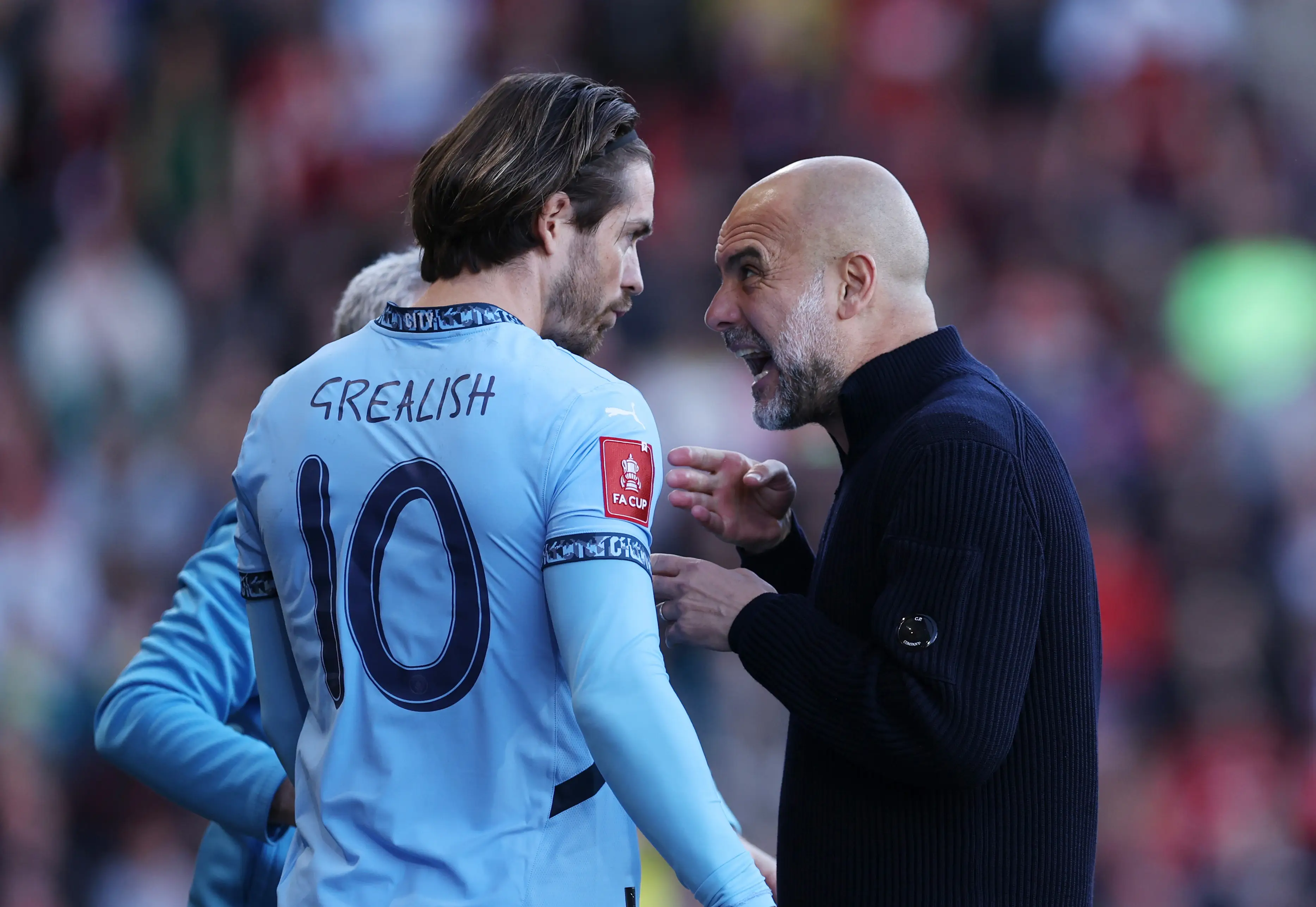 Jack Grealish and Pep Guardiola (Getty)