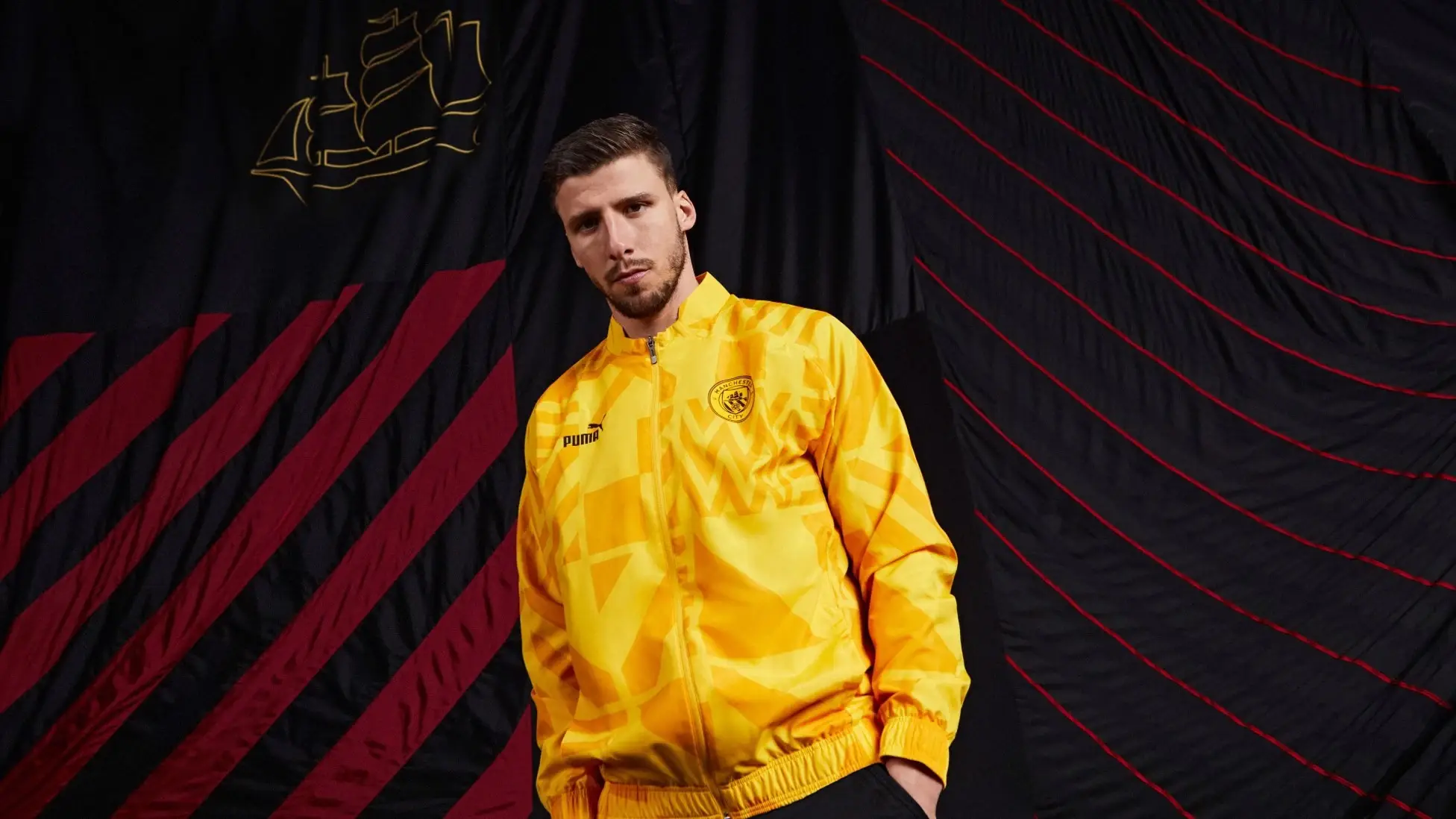 Ruben Dias teases the away kit training training jacket (Manchester City / ManCity.com)