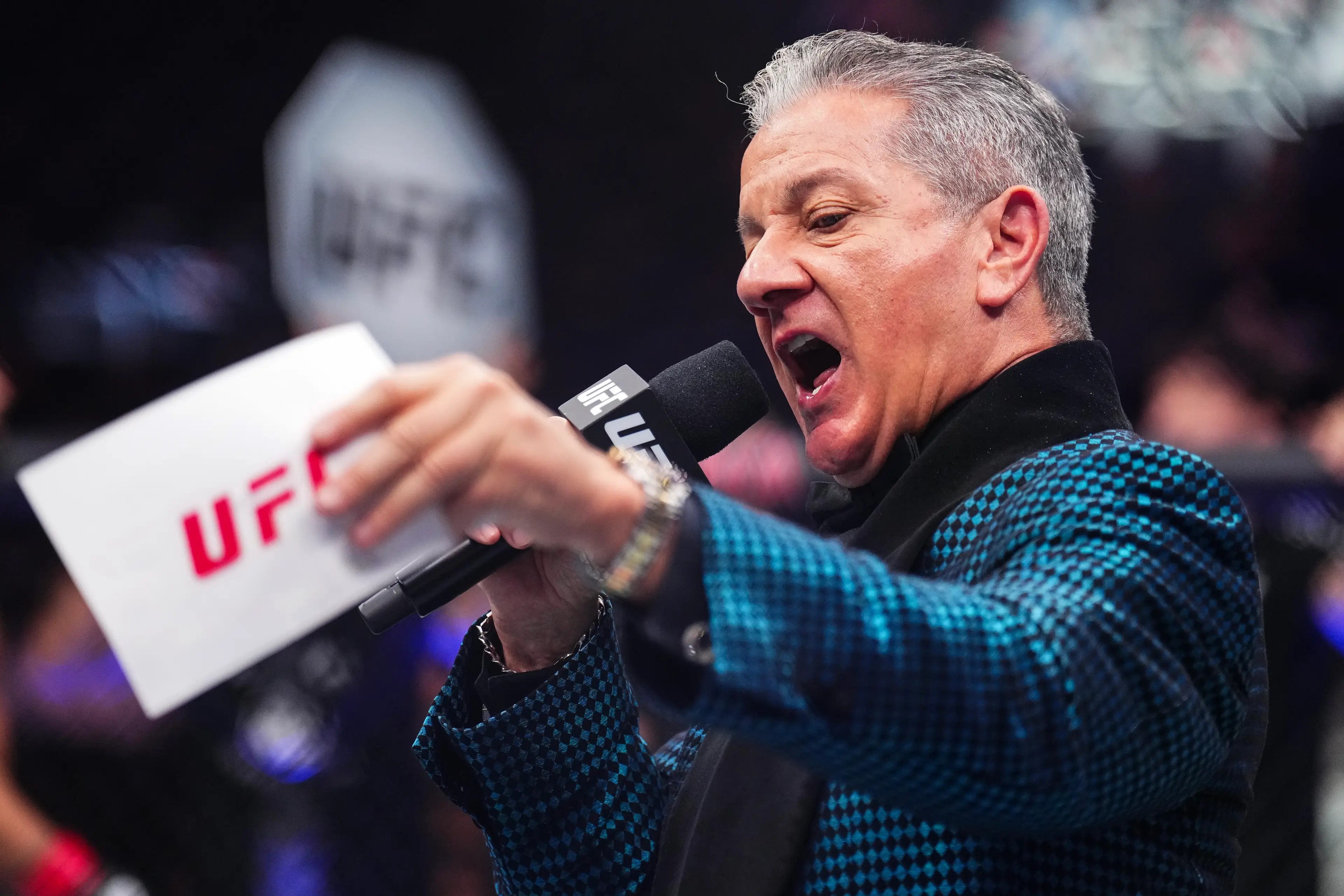 Bruce Buffer made an uncharacteristic error at the start of UFC 324. Image: Getty 