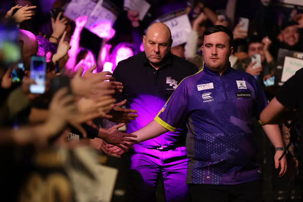 Luke Littler hopes to defend his 2025 title (Drian Dennis/AFP/Getty Images)