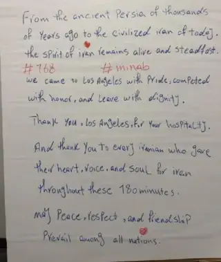 Iran's handwritten note that was left in the dressing after their clash against Belgium. Image credit: IFF