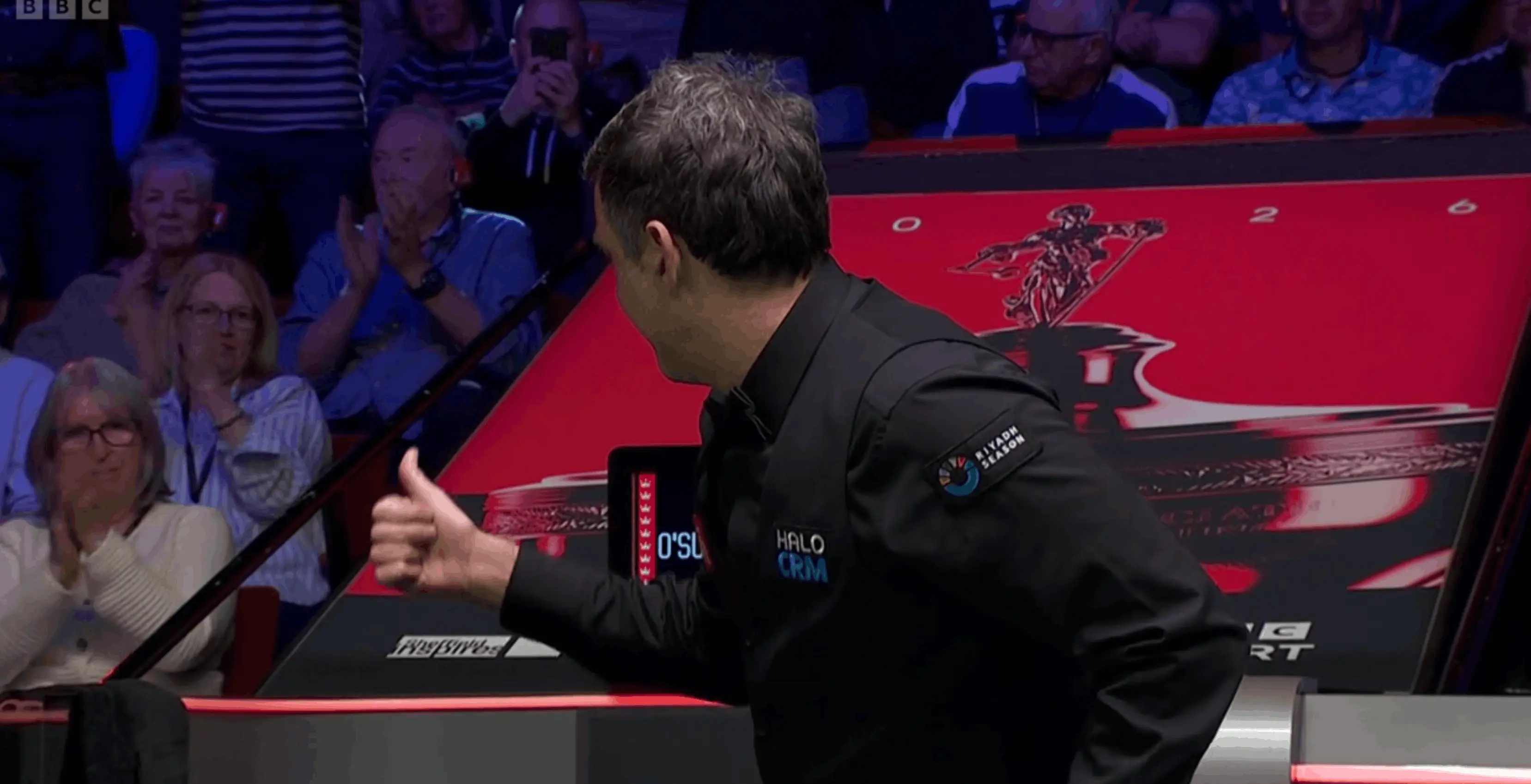 O'Sullivan put his thumb up towards Scholes after his 10-2 win (Image: BBC)