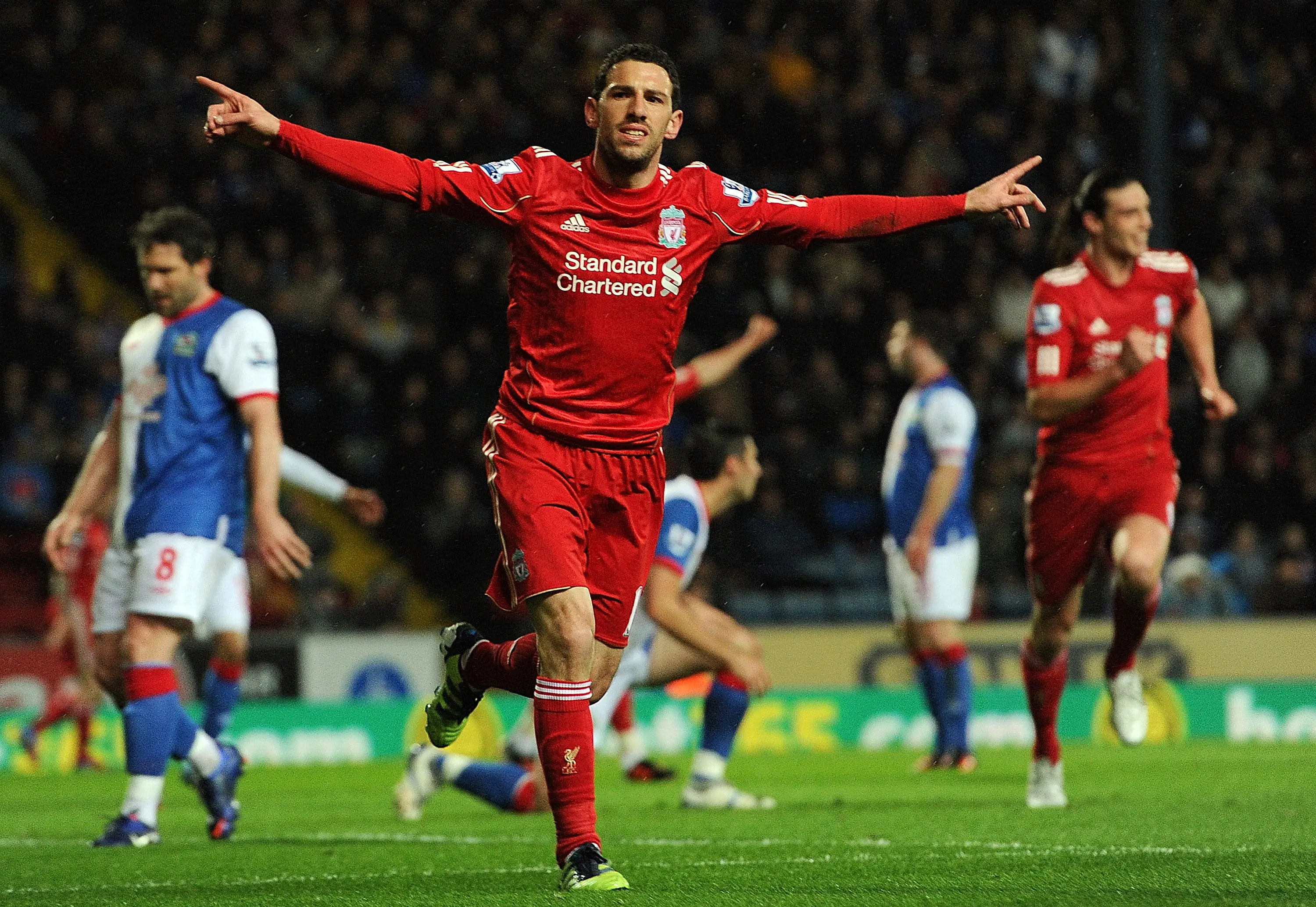 Maxi Rodriguez of Liverpool celebrates after scoring his team's second goal during the Barclays Premier League match between Blackburn Rovers and Liverpool 