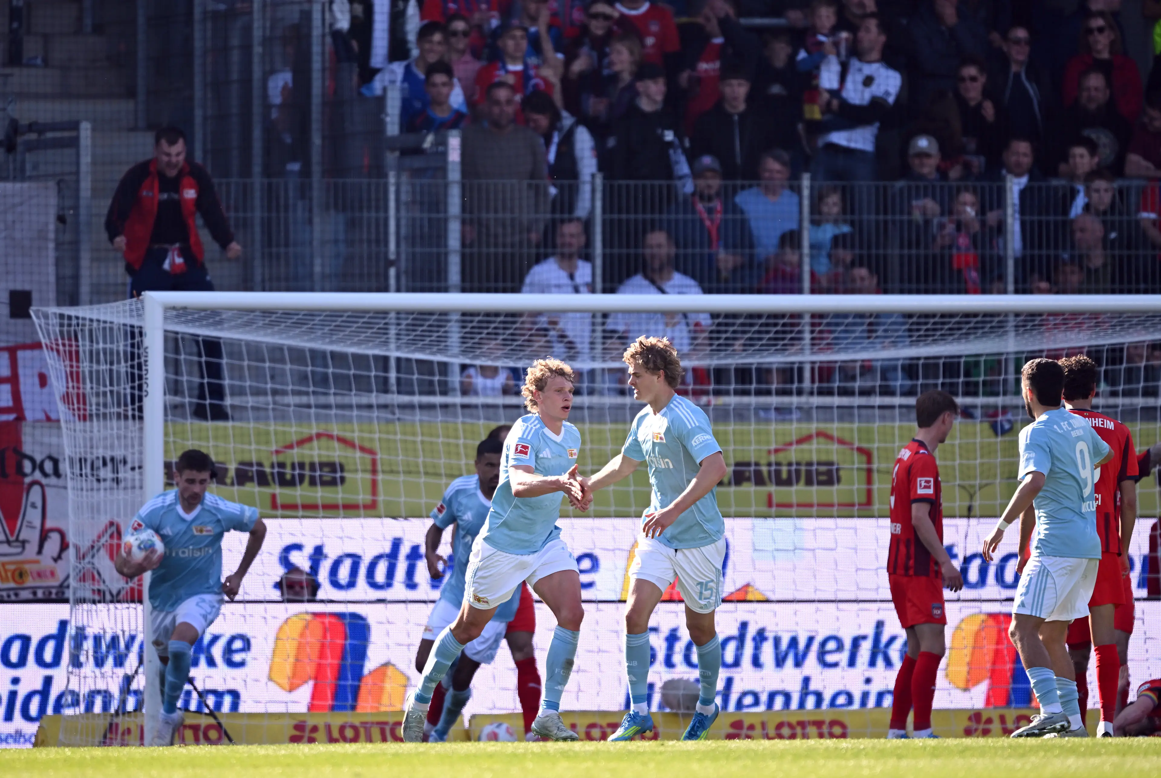 Leopold Querfeld of 1. FC Union Berlin celebrates scoring his team's first goal with teammate Tom Rothe during the Bundesliga  (Getty Images)