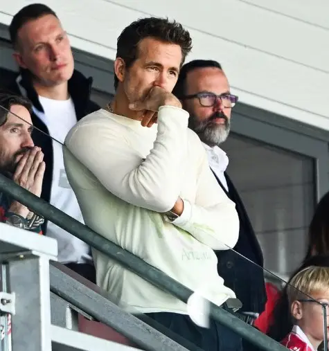Phil Jones was sat in the stands alongside Ryan Reynolds. Image credit: @NathSalt1/X