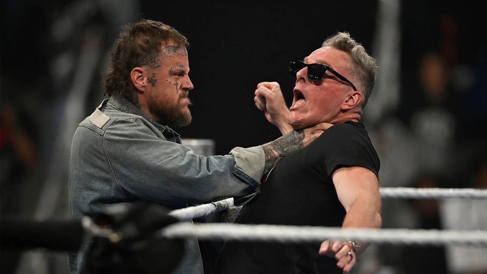 Jelly Roll brawls with Pat McAfee during the April 3 episode of SmackDown (Image: Getty/WWE)