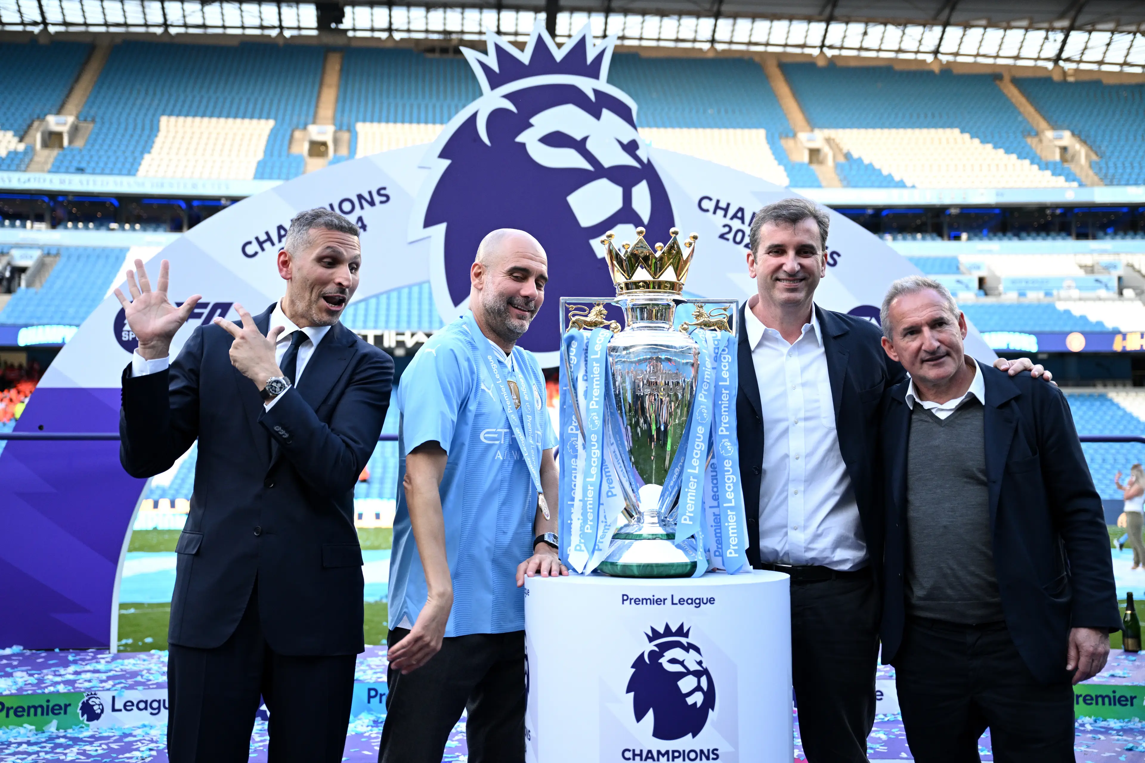 Pep Guardiola with Khaldoon Al-Mubarak, Ferran Soriano and Txiki Begiristain. Image: Getty
