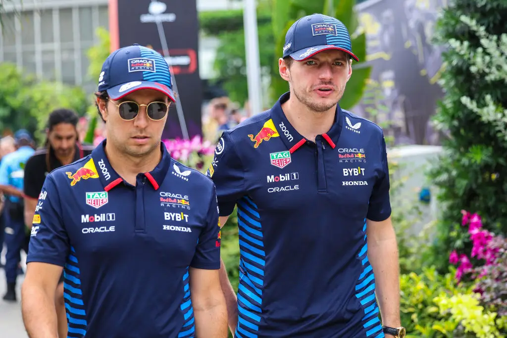 Max Verstappen pictured with Red Bull team-mate Sergio Perez before the Singapore GP -