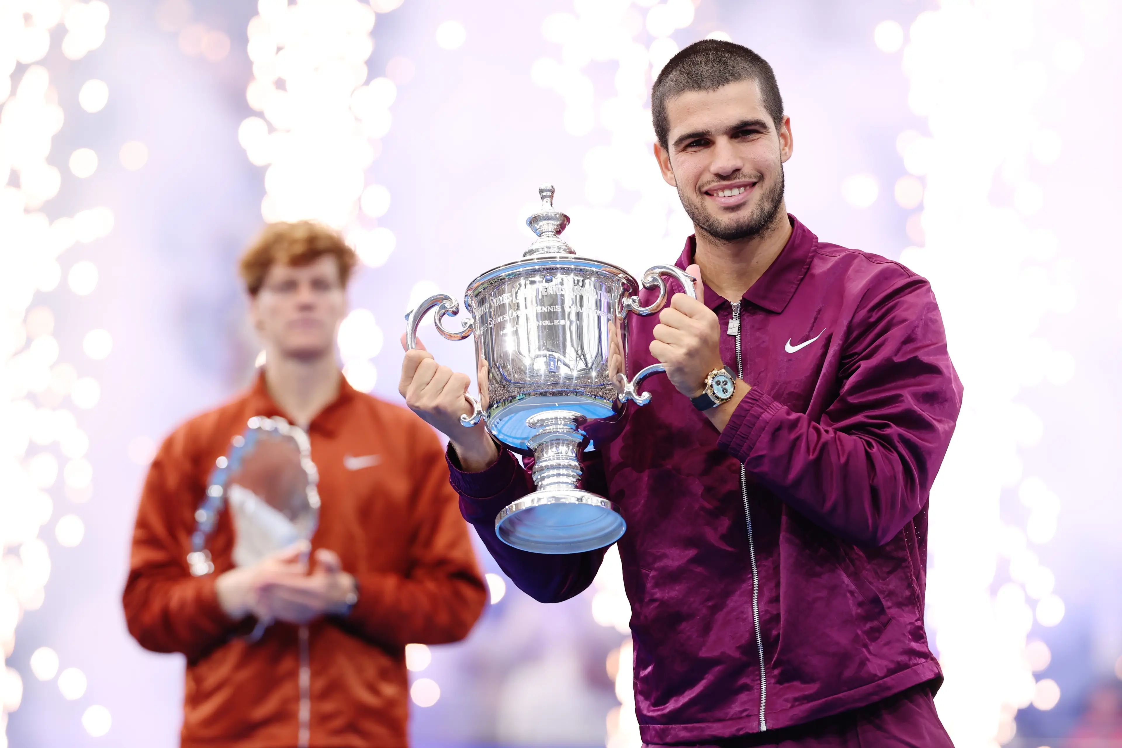 Carlos Alcaraz of Spain poses with his trophy after defeating Jannik Sinner (Image: Getty)