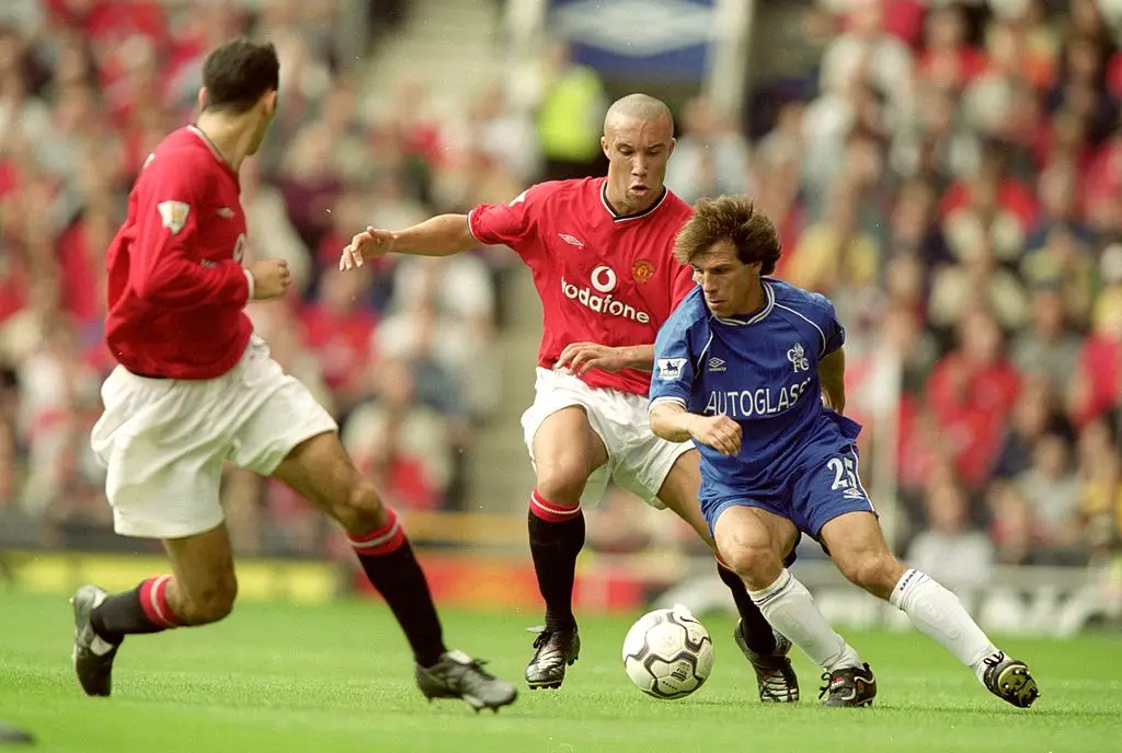 Gianfranco Zola in action for Chelsea against Manchester United (Credit:Getty)