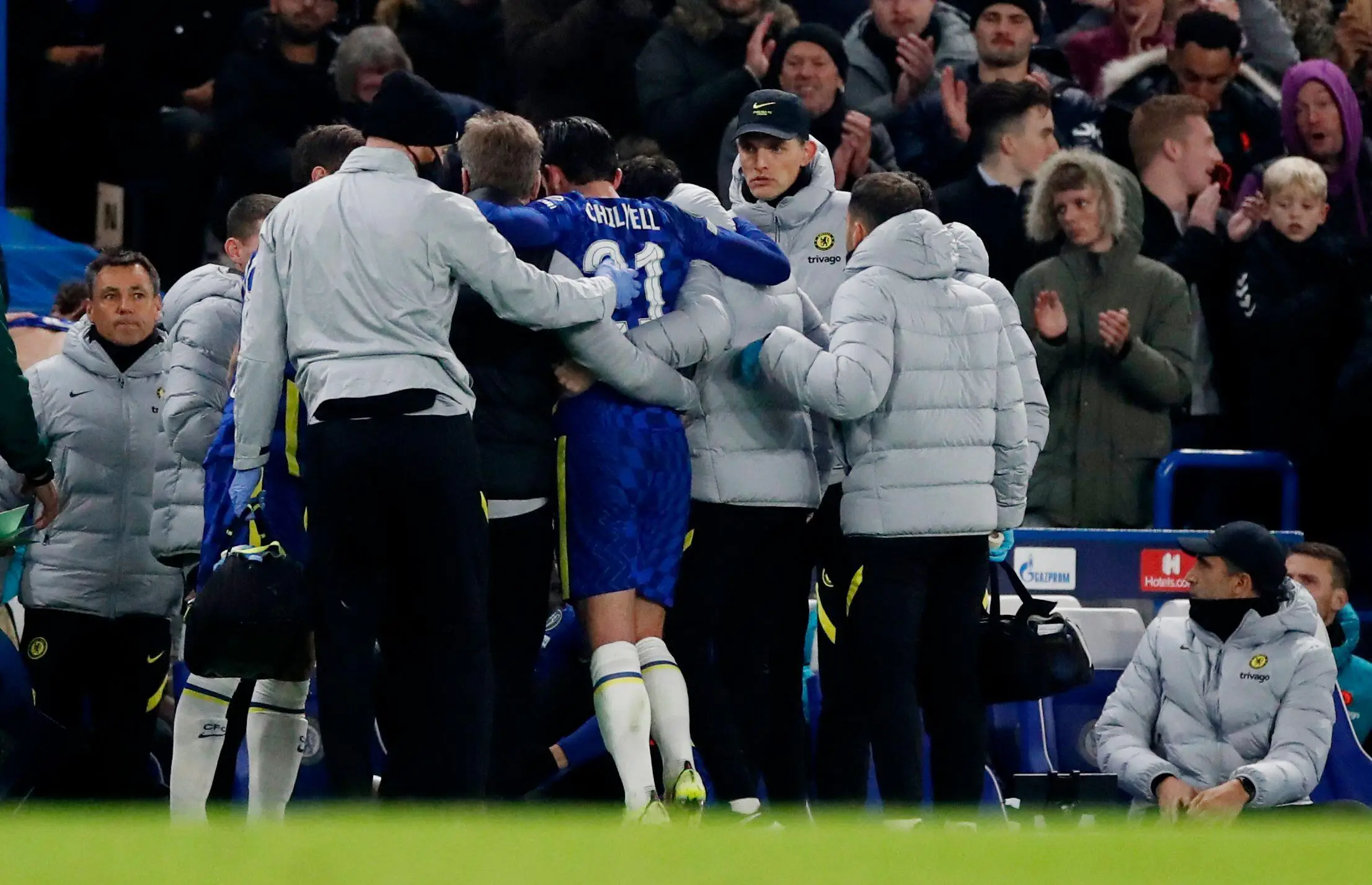Chelsea's Ben Chilwell walks off the pitch after receiving medical attention. (Alamy)
