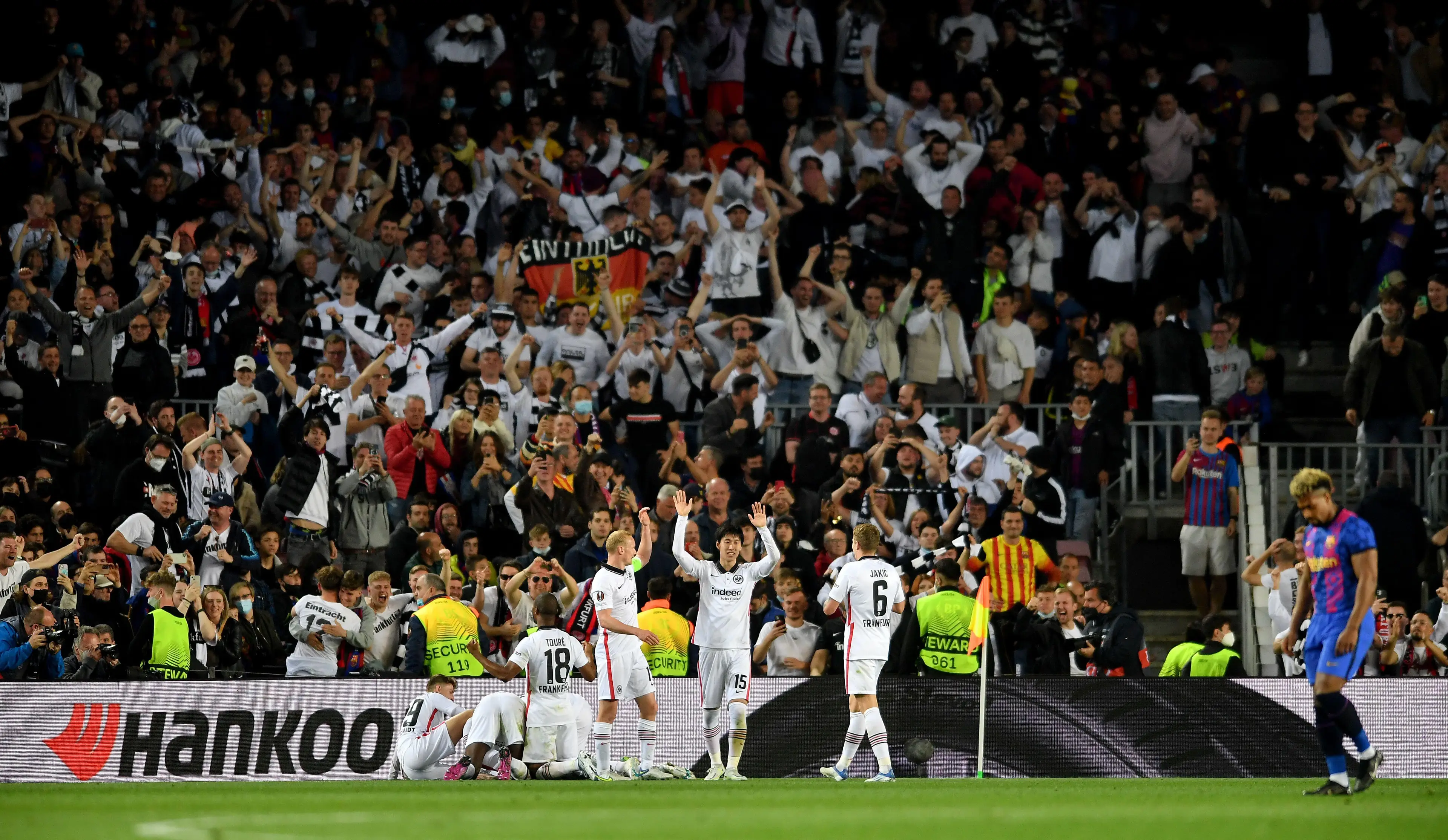 Frankfurt players celebrate their third goal in front of their fans. Image: PA Images