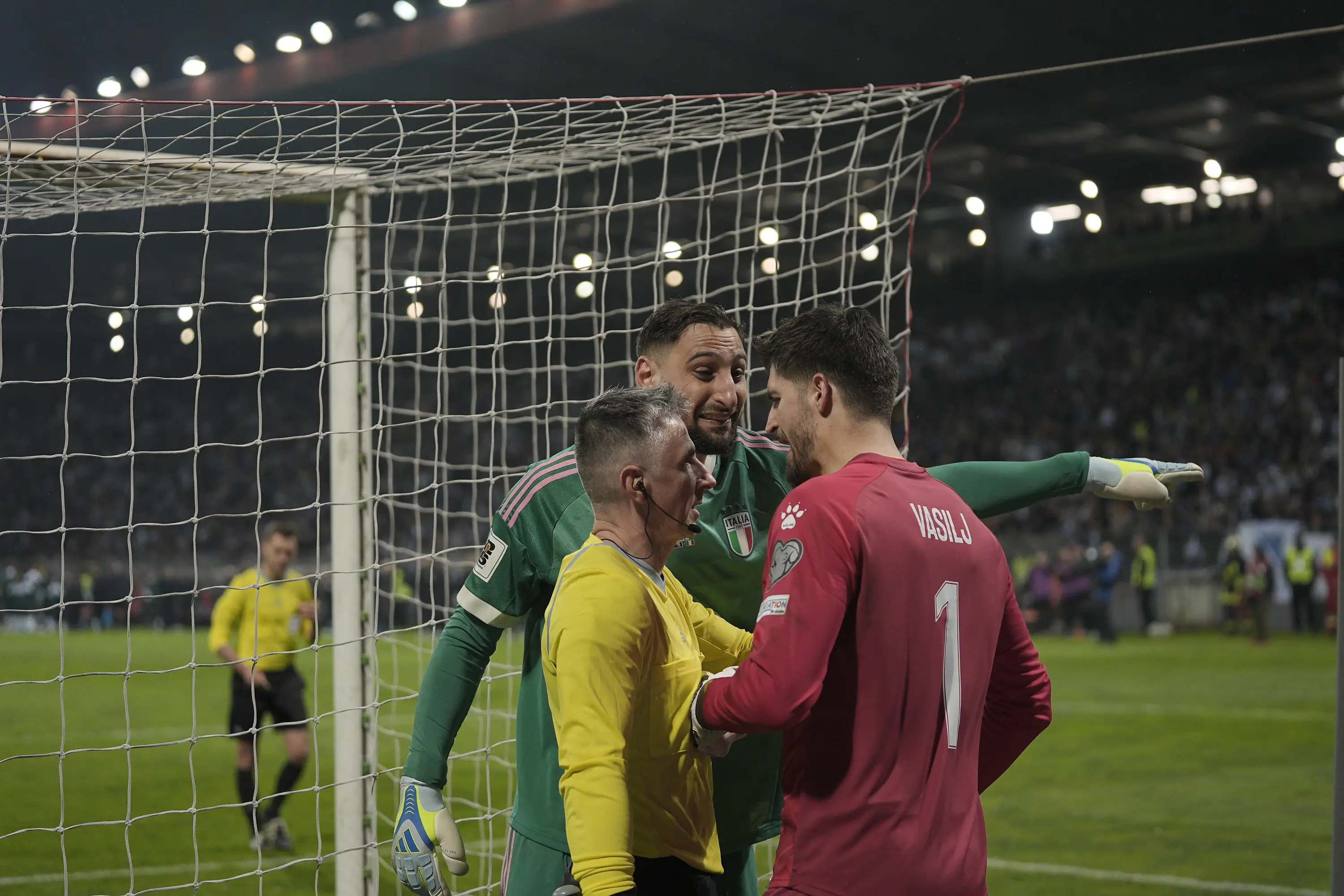 Donnarumma clashes with Vasilj during Tuesday's penalty shootout. Image credit: Getty