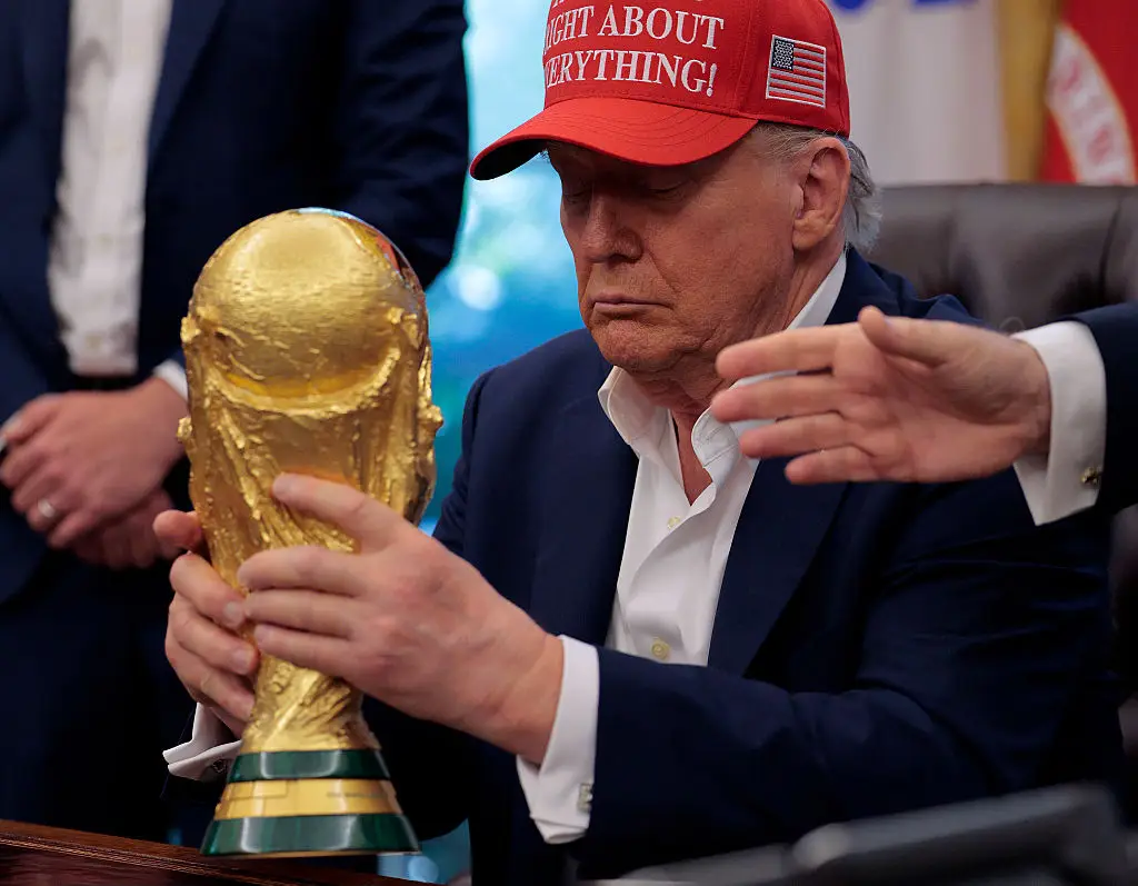 Donald Trump with the World Cup trophy (Credit:Getty)