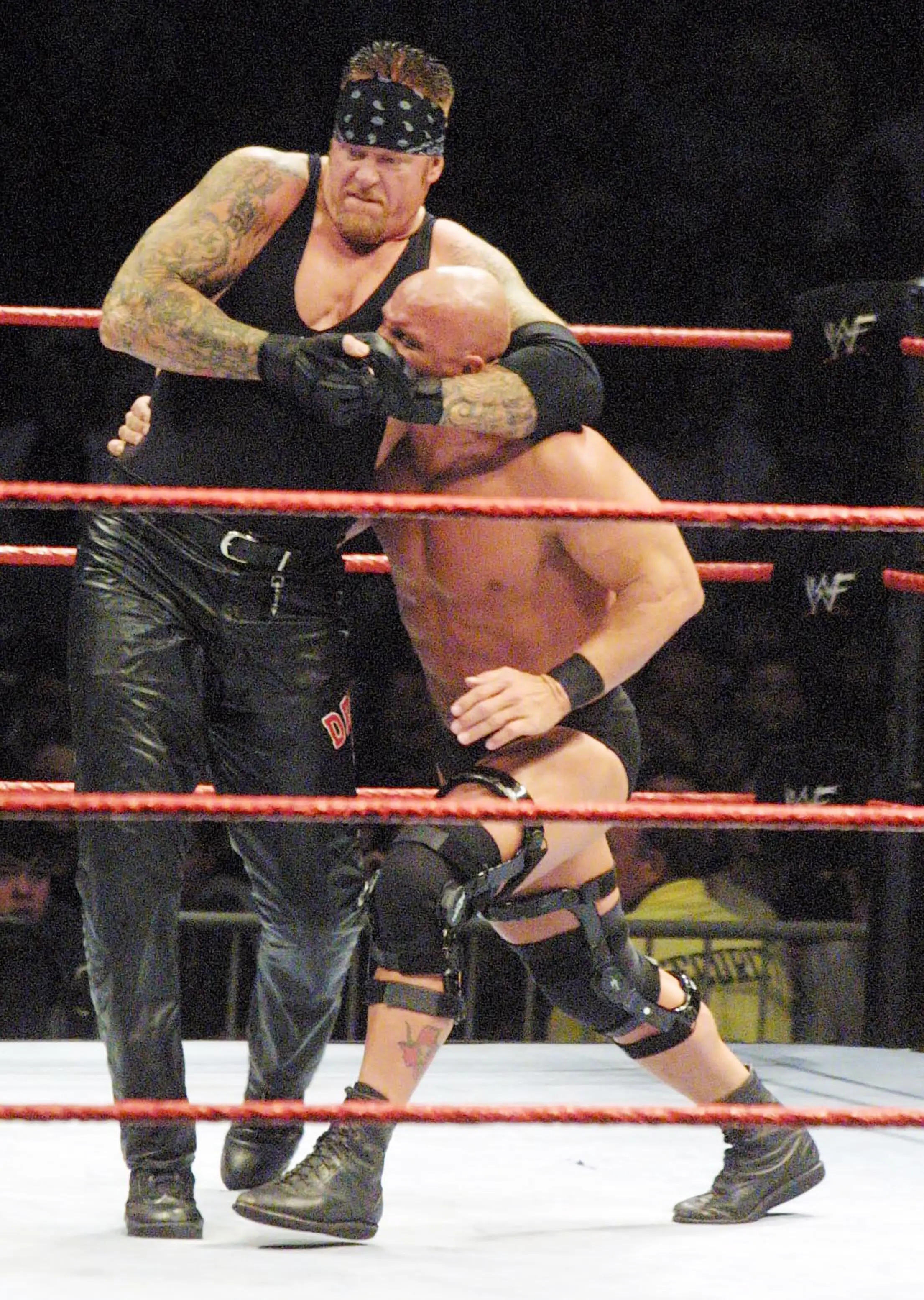 Triple H revealed The Undertaker's ear was almost severed (Image: Alamy)