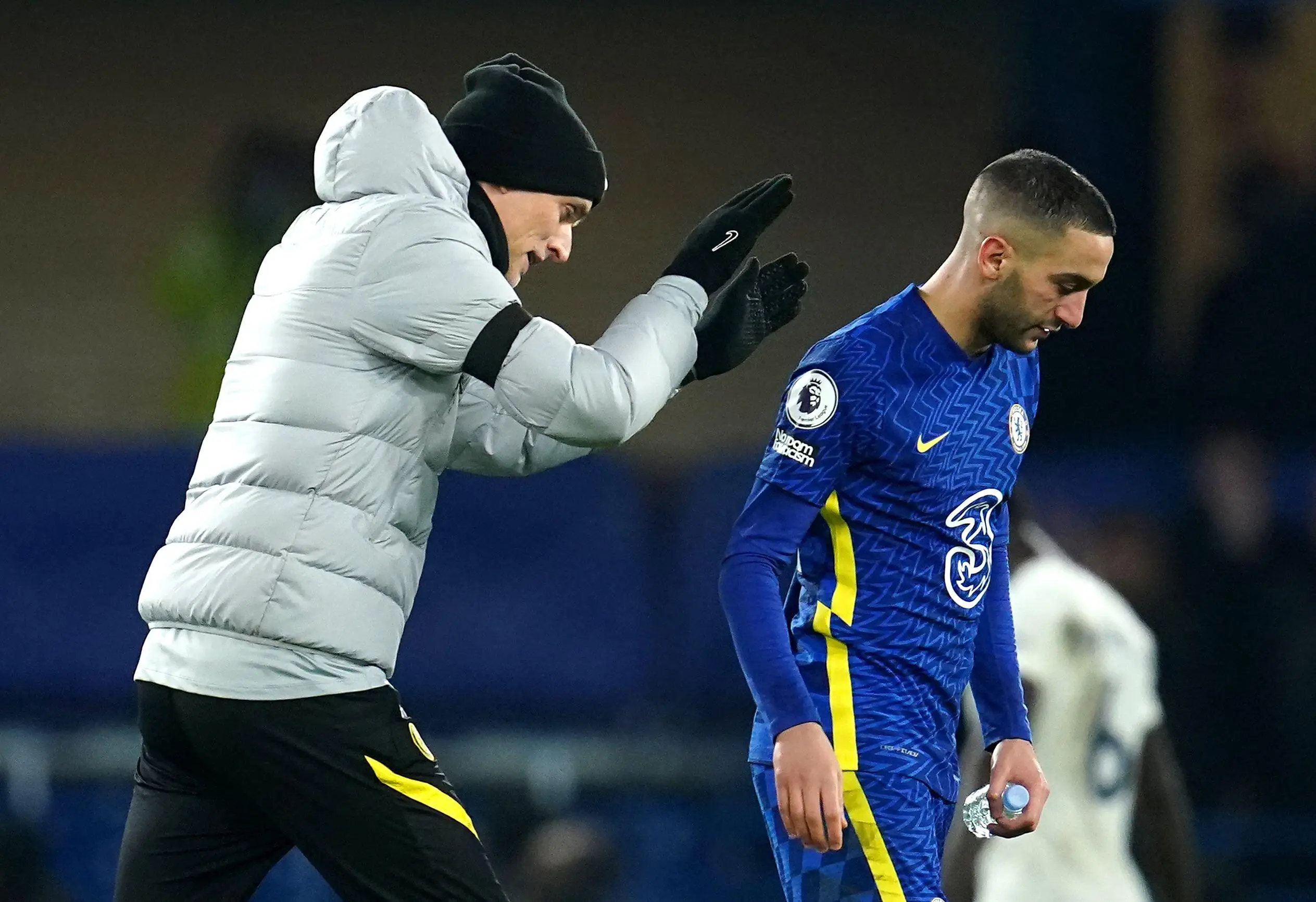 Chelsea manager Thomas Tuchel (left) and Hakim Ziyech. (Alamy)