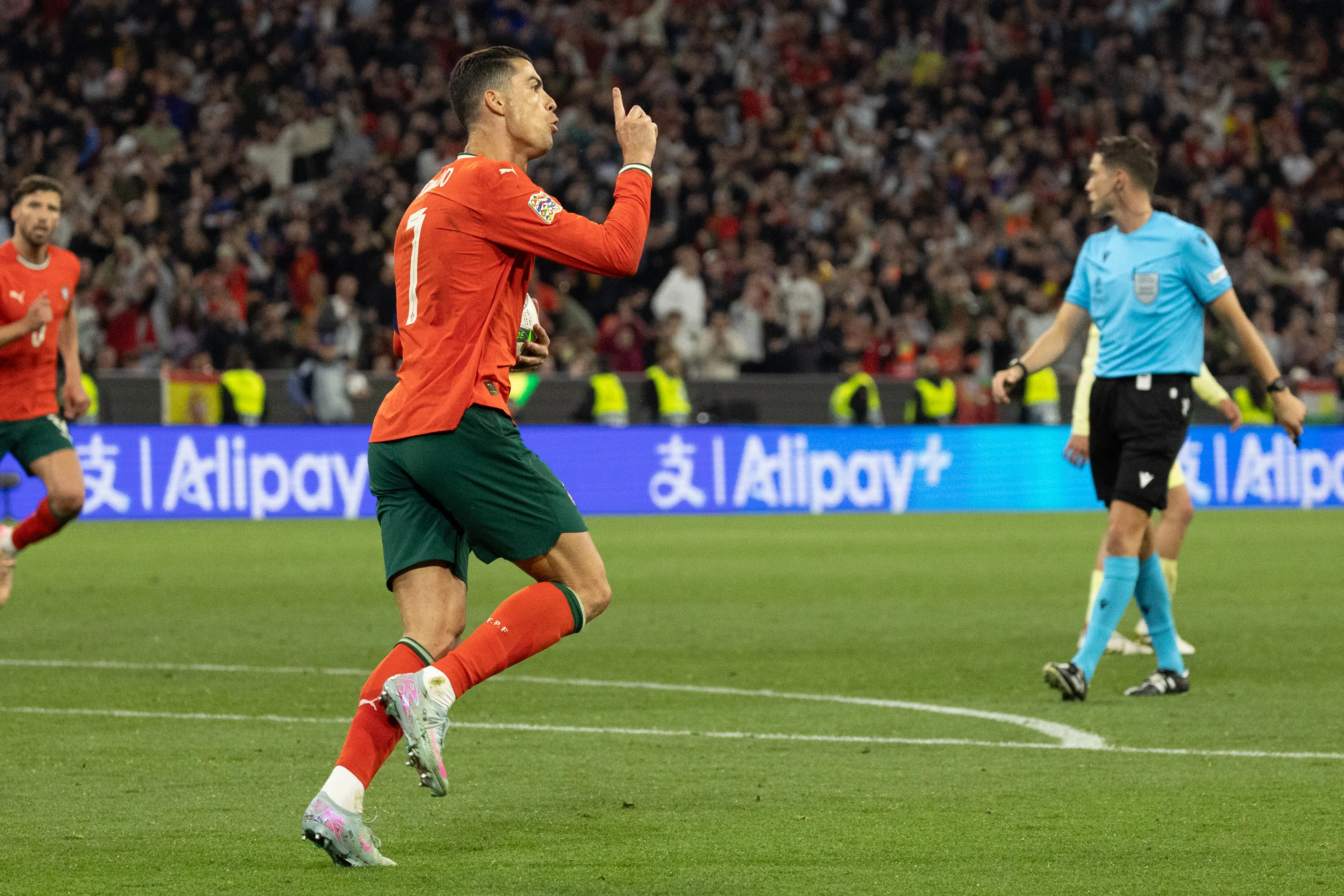 Cristiano Ronaldo wheels away in celebration afters scoring for Portugal. Image: Getty 
