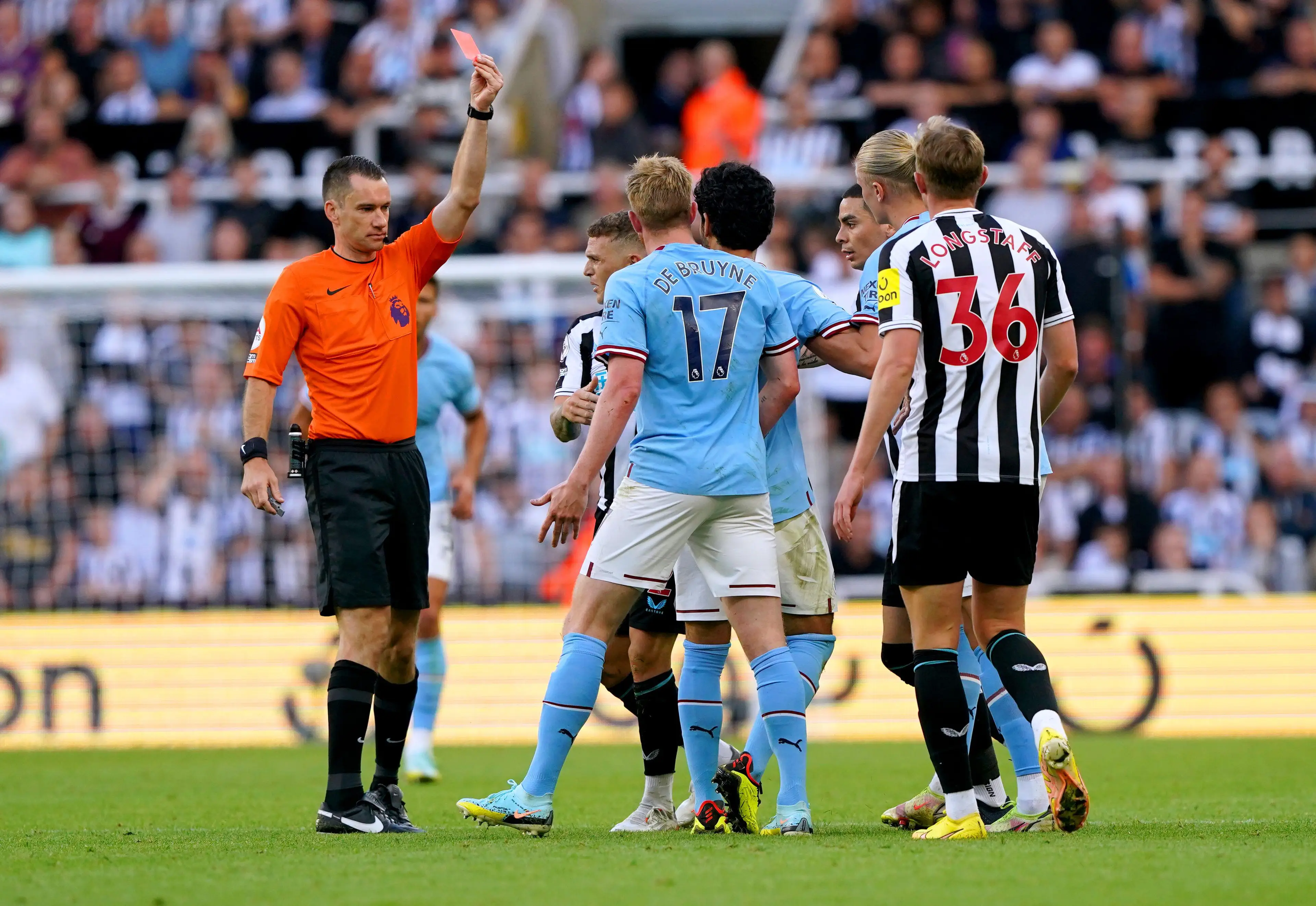 Jarred Gillett Produces A Red Card (Image: PA Images/Alamy)