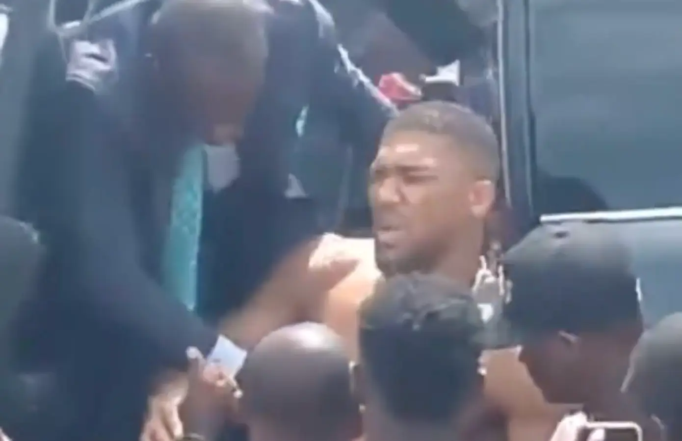 Joshua was pulled out of the car by rescuers (Image: Twitter)