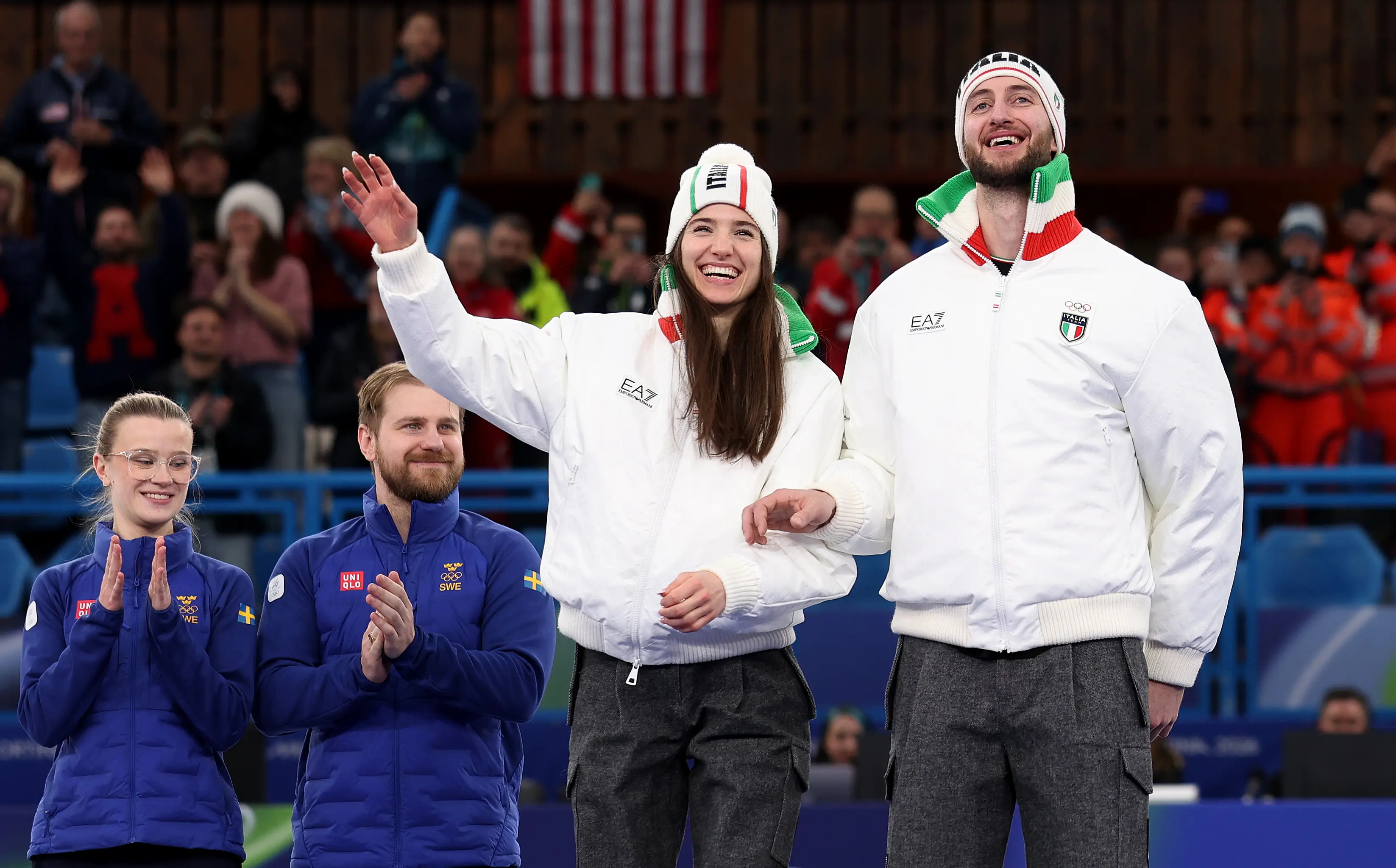 Constantini hugged Romei in the stands after the bronze medal win. Image: Getty