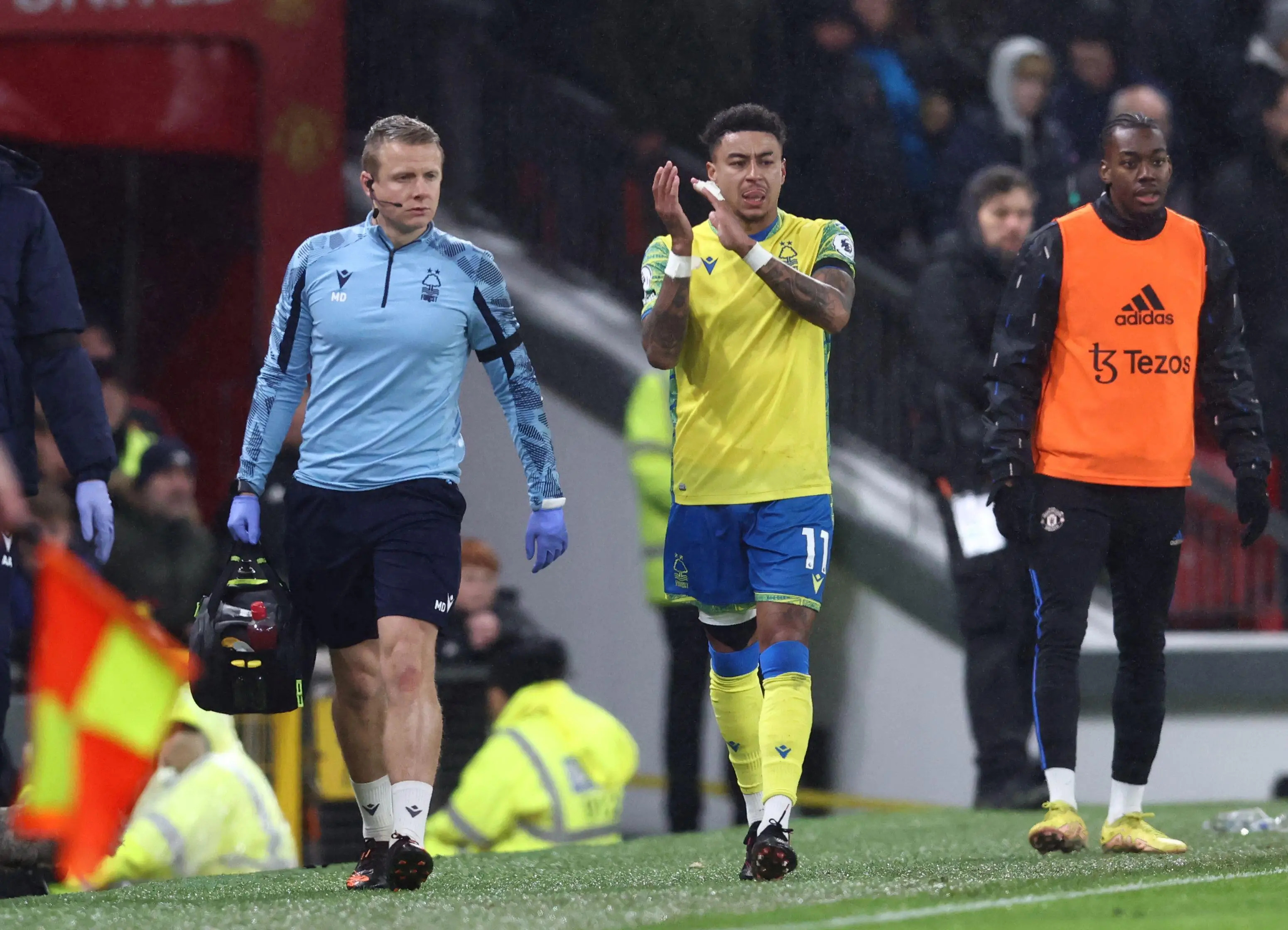Lingard reciprocates by applauding the home fans. Image: Alamy