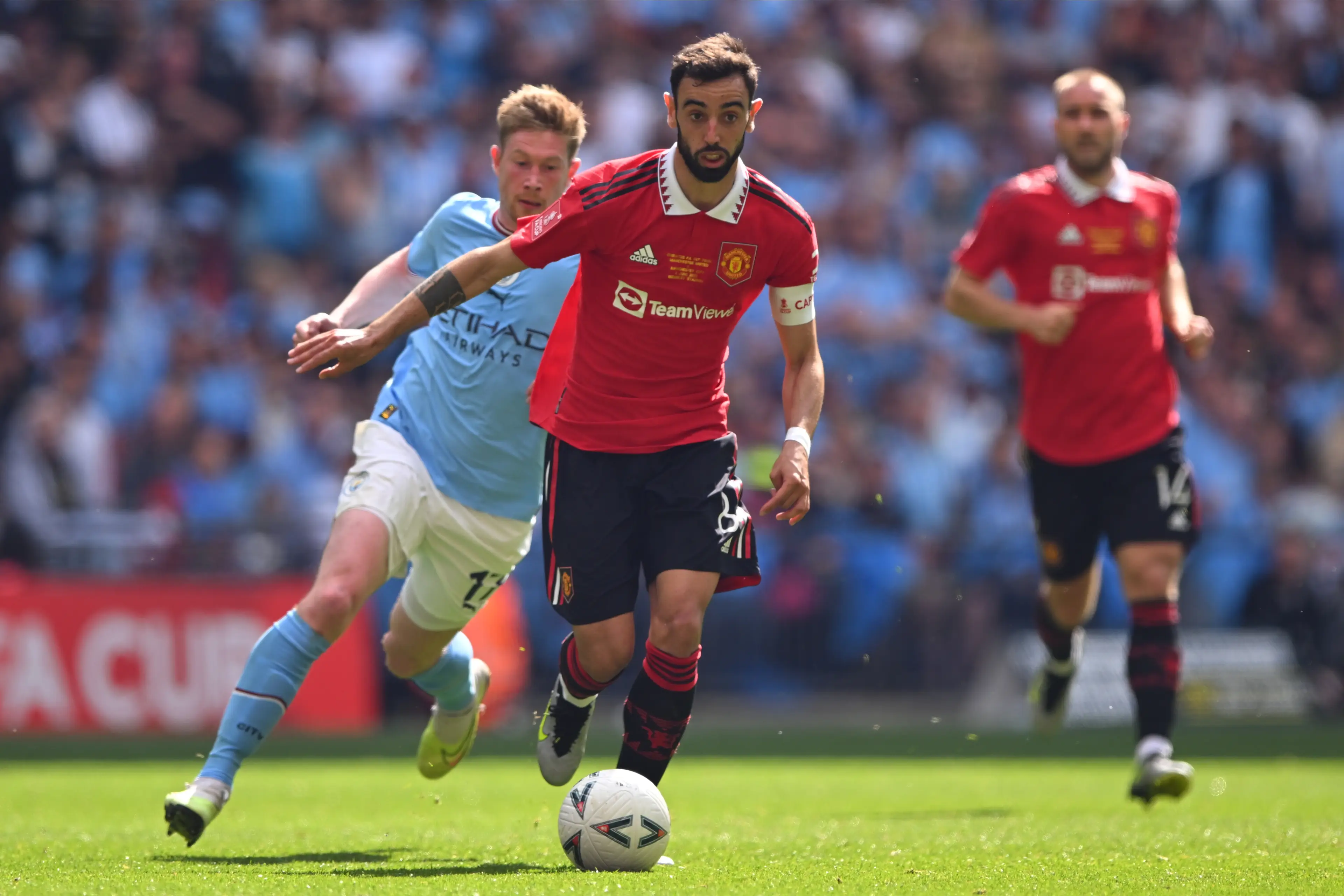Bruno Fernandes and Kevin De Bruyne during last season's FA Cu final. Image: Getty