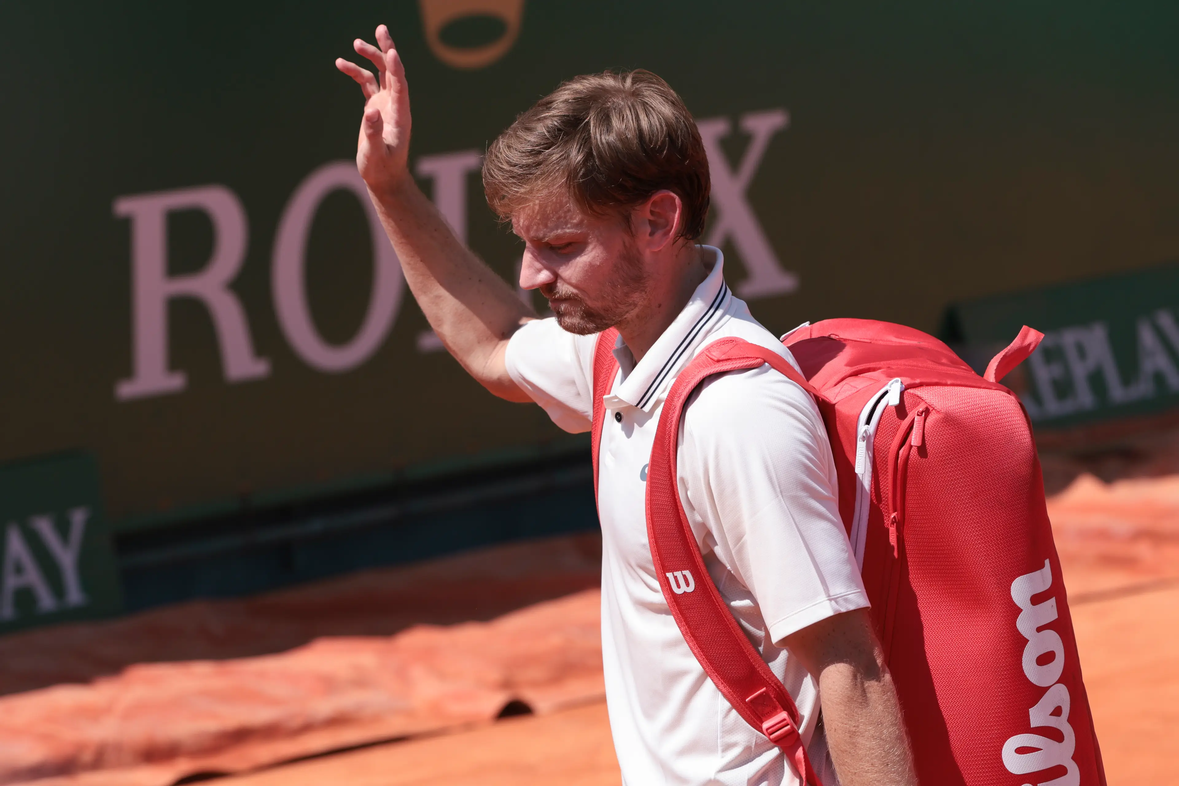 David Goffin of Belgium salutes the fans after his last match in Monaco - he'll retire at the end of the season - following his first round loss against Emilio Nava of USA (Getty Images)