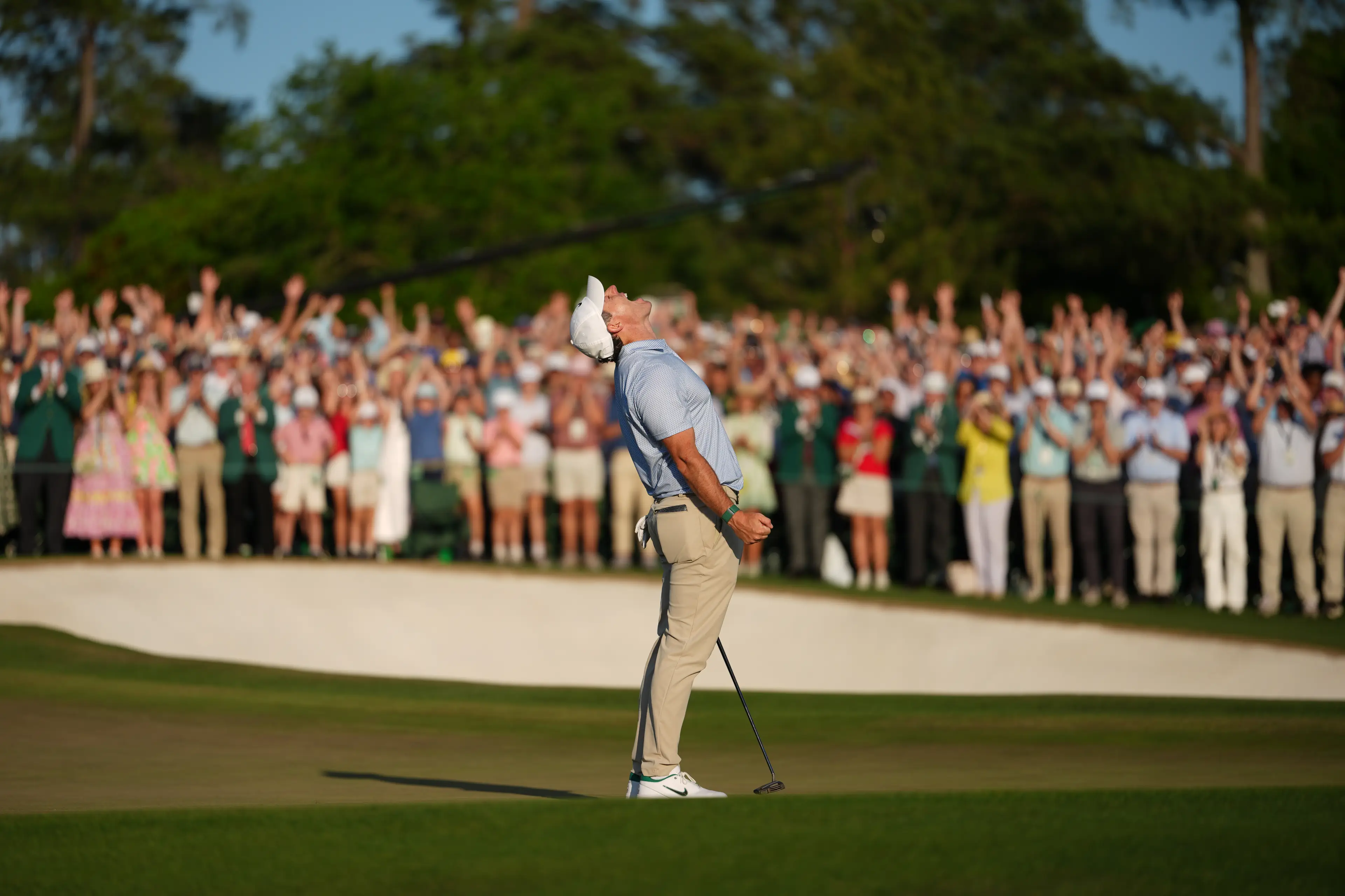 Rory McIlroy celebrates after making the winning putt. Image credit: Getty