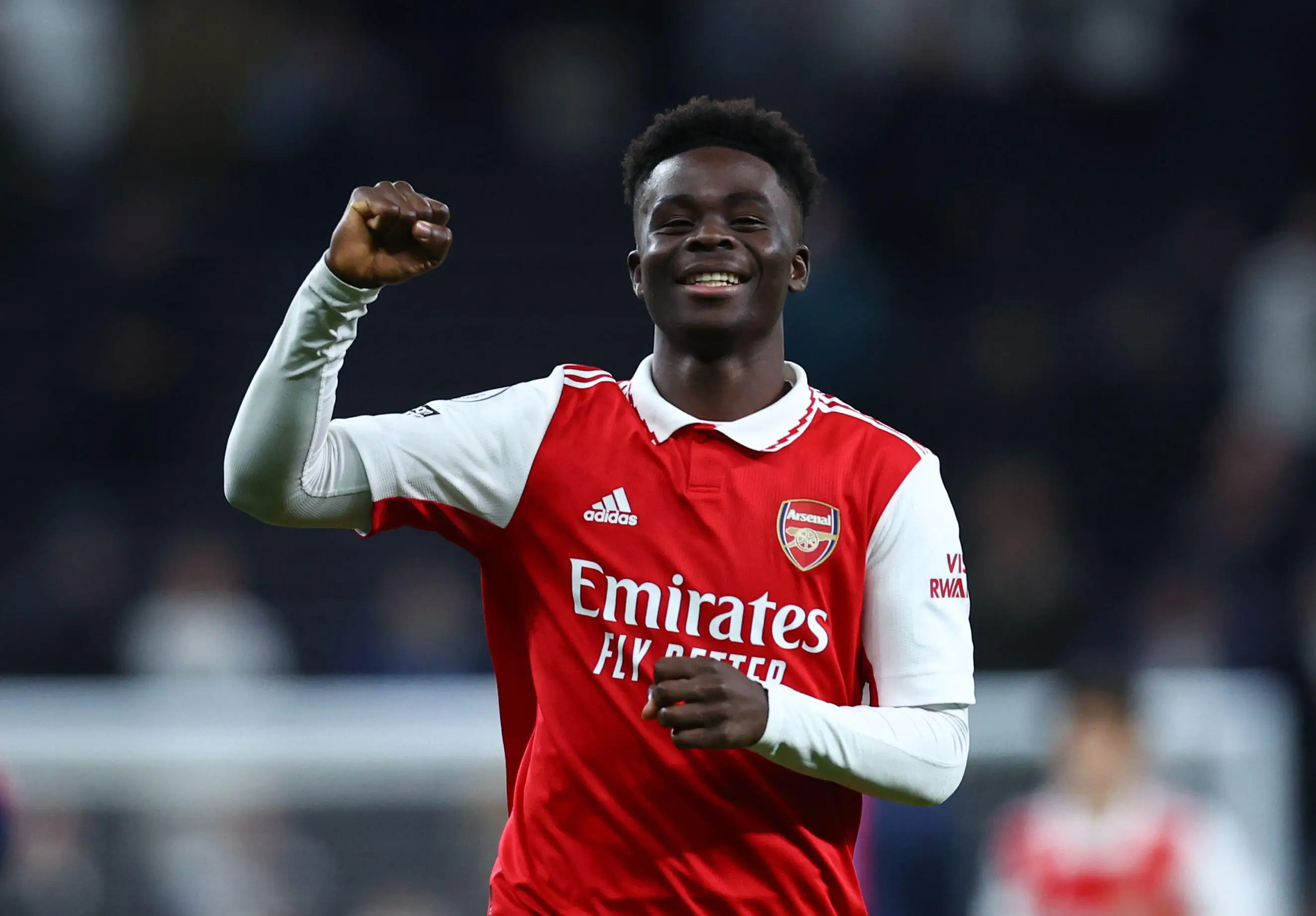Arsenal star Bukayo Saka celebrates (