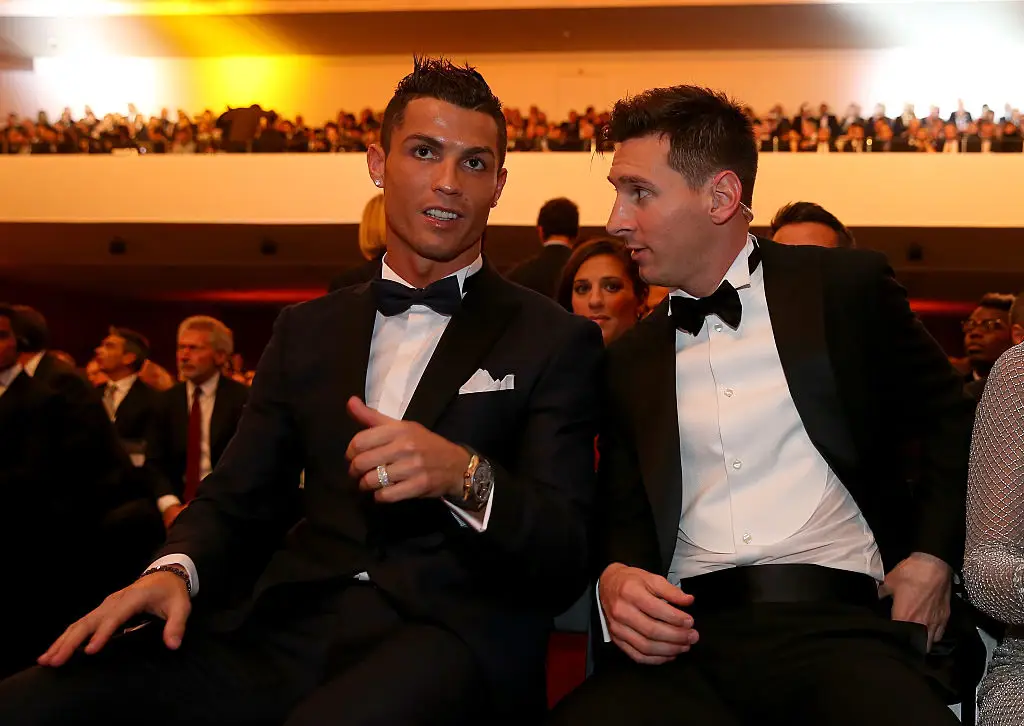 Cristiano Ronaldo and Lionel Messi in conversation at the 2015 Ballon d'Or awards ceremony (Image: Getty)